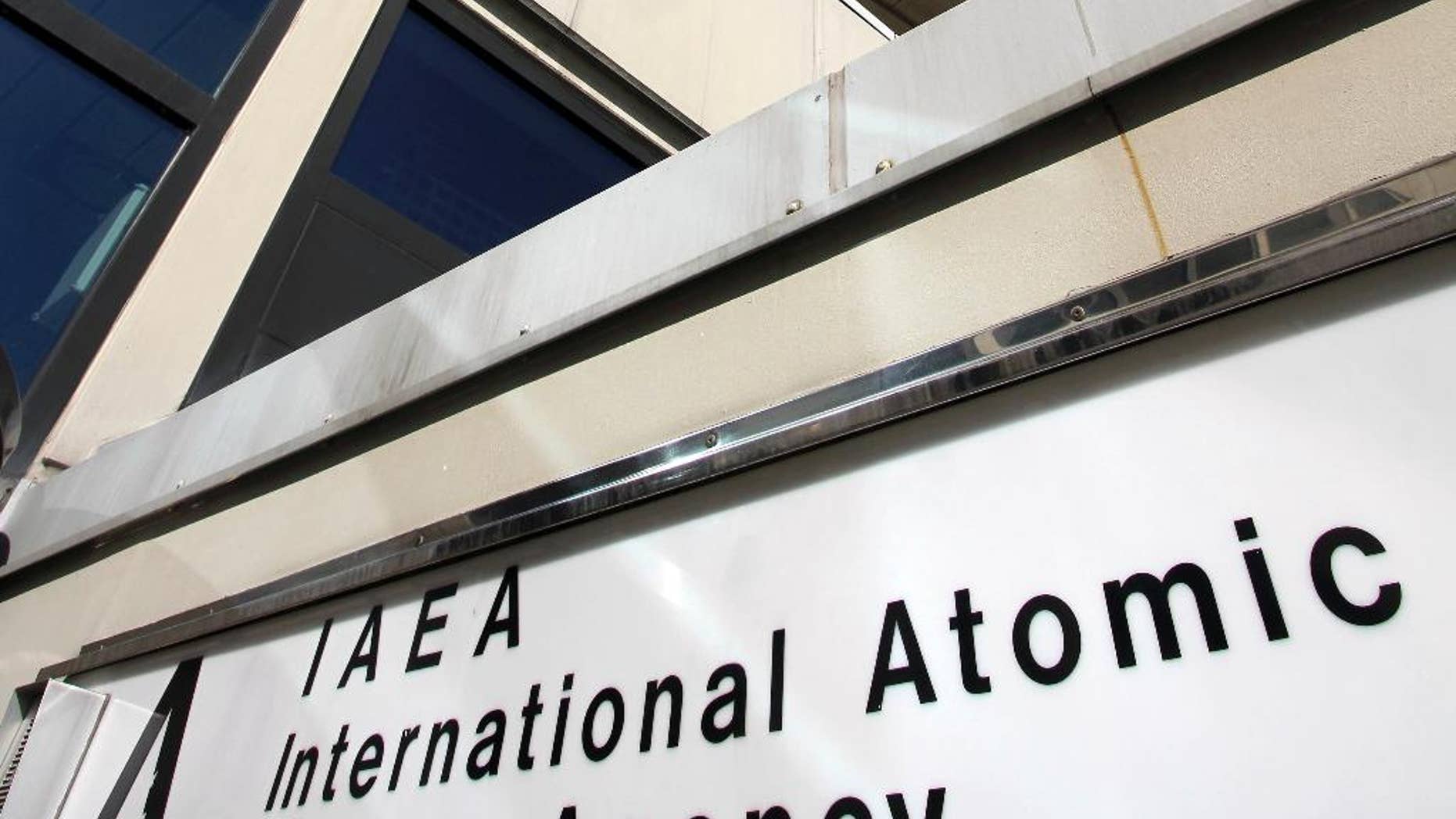FILE - In this March 5, 2013, file photo, a view of the U.N. building with the International Atomic Energy Agency, IAEA, office inside, at the International Center, in Vienna, Austria. Iran has agreed to cooperate with the U.N. in answering longstanding allegations about possible past work to develop nuclear weapons at its Parchin plant, but only with the Iranians conducting the inspections themselves. A draft of the Parchin document, as seen by The Associated Press, essentially cedes the Parchin inspection to Iran, allowing it to collect its own environmental samples on the site and carry out other work usually done by IAEA experts. The IAEA will be able to review the Iranians’ work after the fact. (AP Photo/Ronald Zak, File)