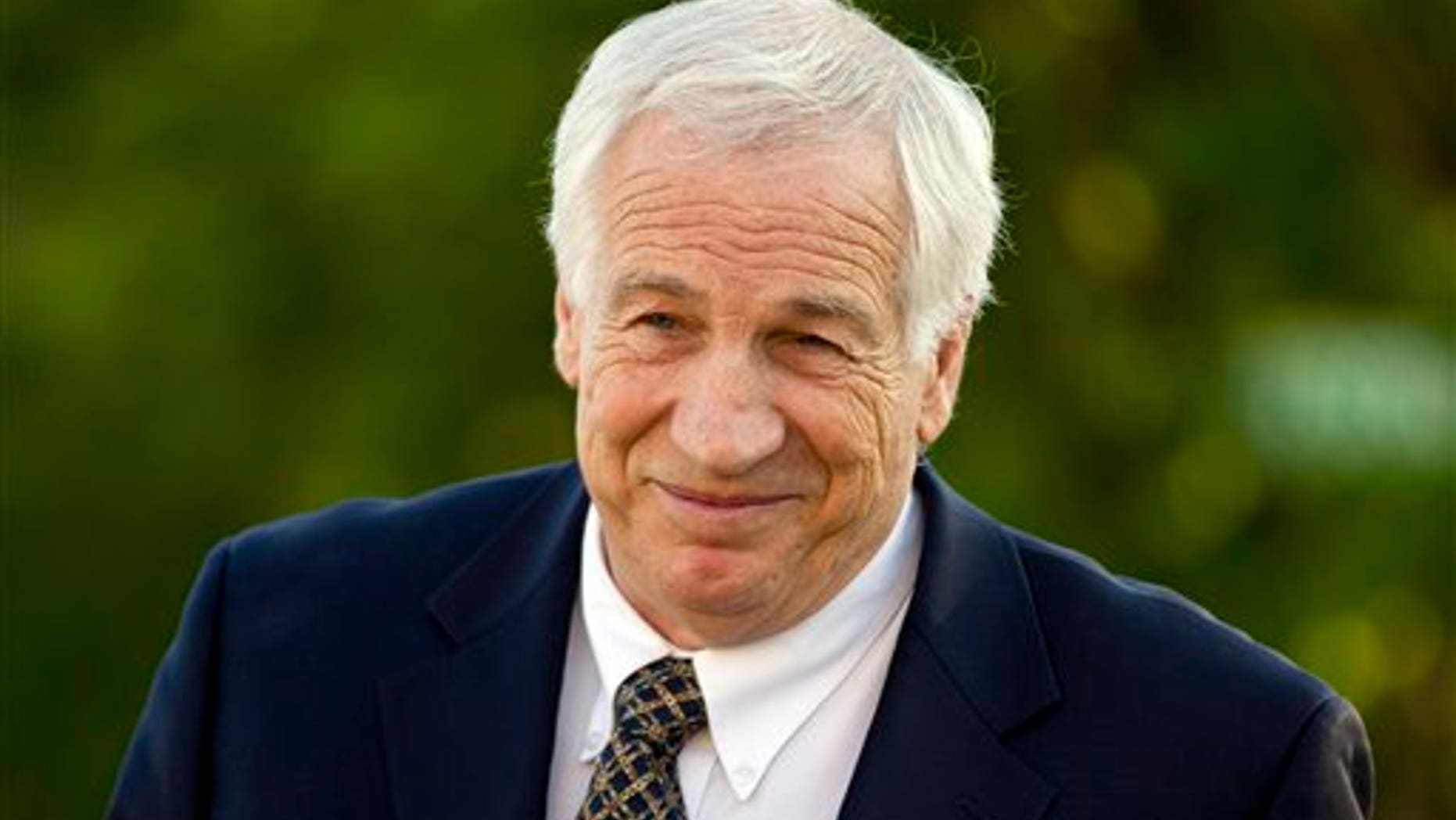 This April 5, 2012 file photo shows former Penn State assistant football coach Jerry Sandusky arriving at the Centre County Courthouse in Bellefonte, Pa.