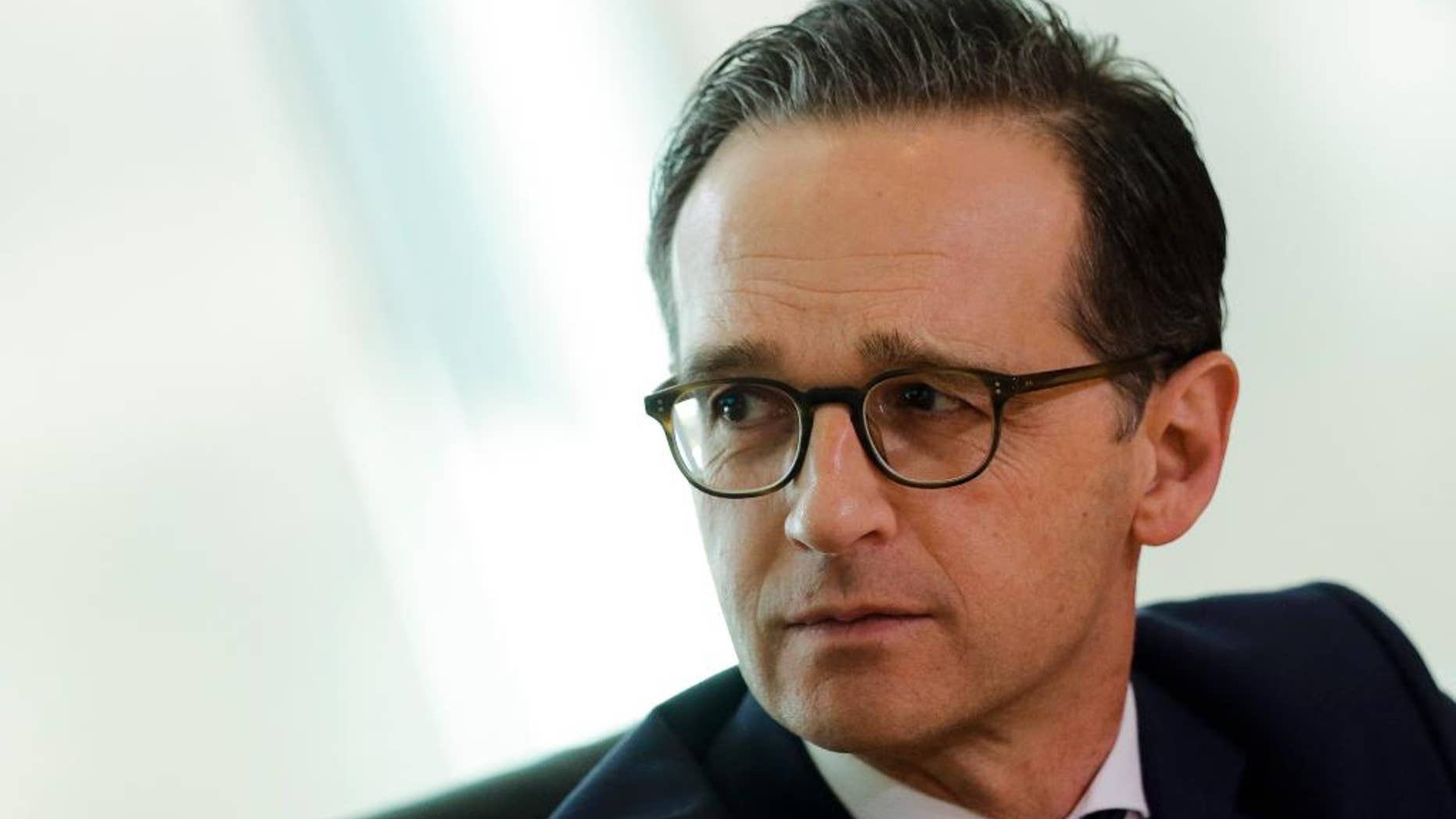 German Justice Minister Heiko Maas attends the weekly cabinet meeting of the German government at the chancellery in Berlin, Wednesday, March 22, 2017. Germany’s Cabinet on Wednesday approved a bill that will annul the convictions of thousands of gay men under a law criminalizing homosexuality that was applied zealously in post-World War II West Germany. (AP Photo/Markus Schreiber)