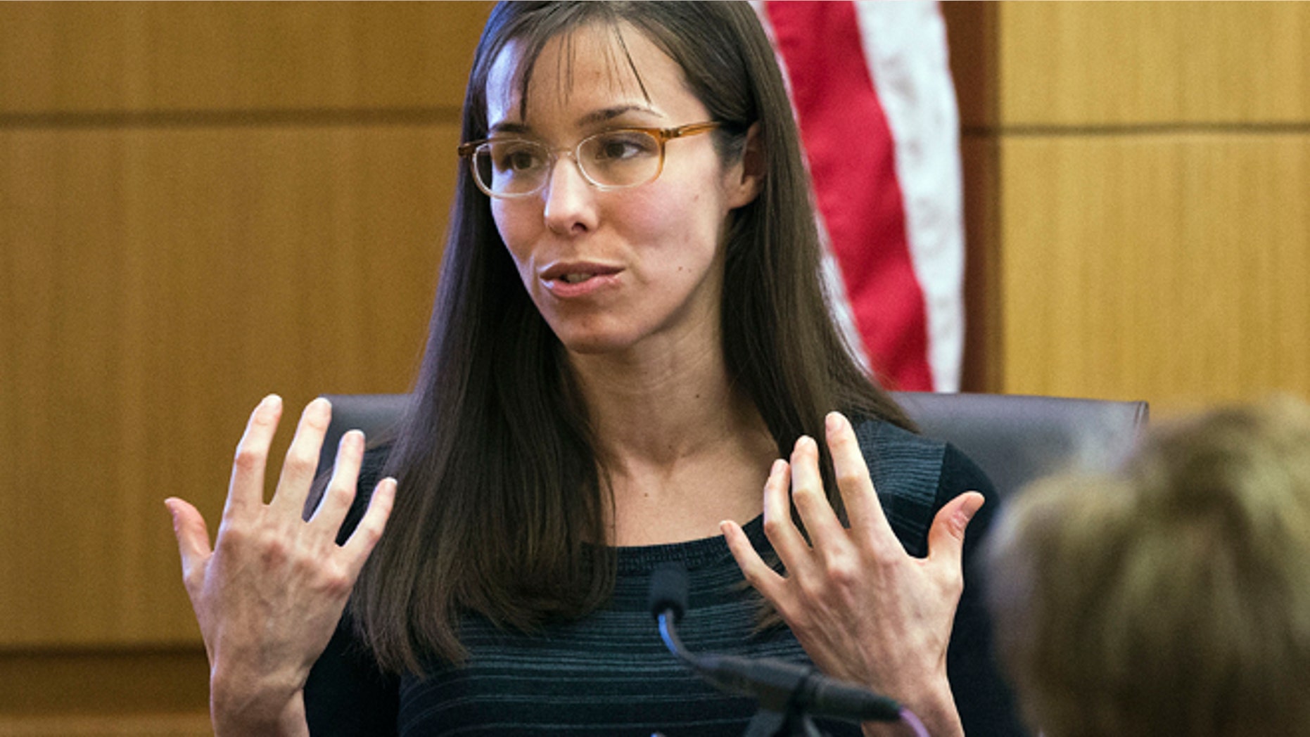 This March 5, 2013 photo shows Jodi Arias gesturing toward the jury, in Maricopa County Superior Court in Phoenix.
