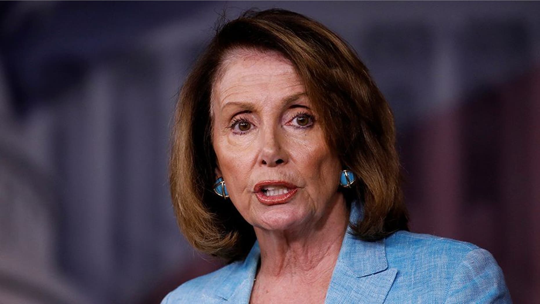 House Minority Leader Nancy Pelosi speaks about the recent attack on the Republican Congressional Baseball team during her weekly press conference on Capitol Hill in Washington, U.S., June 15, 2017. REUTERS/Aaron P. Bernstein - RC181A9DEA30