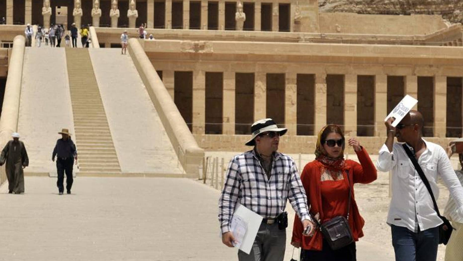 Iranian tourists visit the Temple of Hatshepsut in Egypt on June 3, 2013