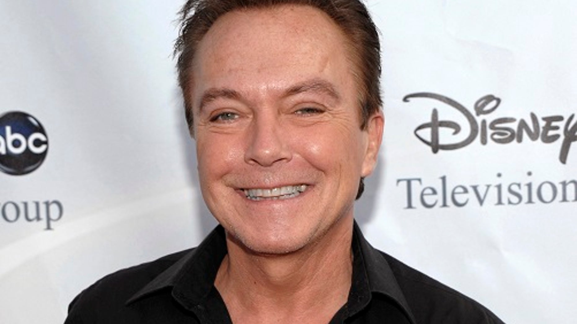 FILE - In this Aug. 8, 2009, file photo, actor-singer David Cassidy arrives at the ABC Disney Summer press tour party in Pasadena, Calif. Former teen idol Cassidy of "The Partridge Family" fame has died at age 67, publicist said Tuesday, Nov. 21, 2017. (AP Photo/Dan Steinberg, File)