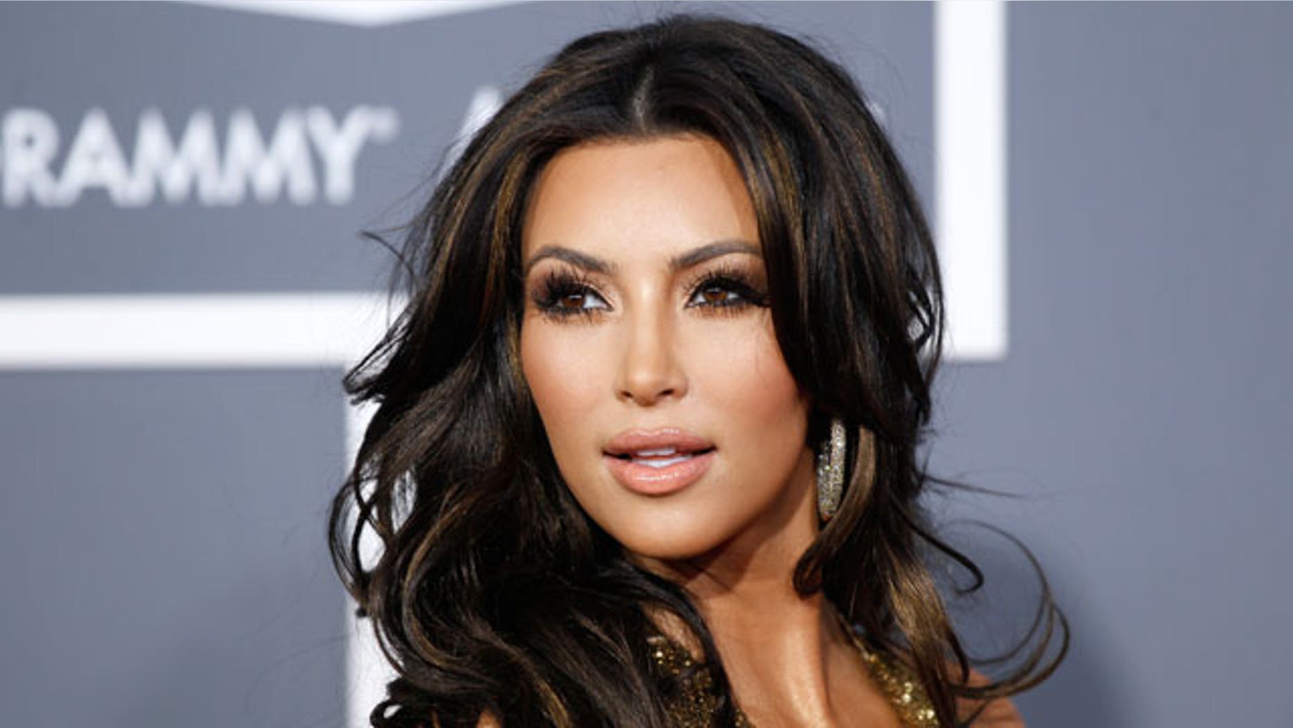 TV personality Kim Kardashian arrives at the 53rd annual Grammy Awards in Los Angeles