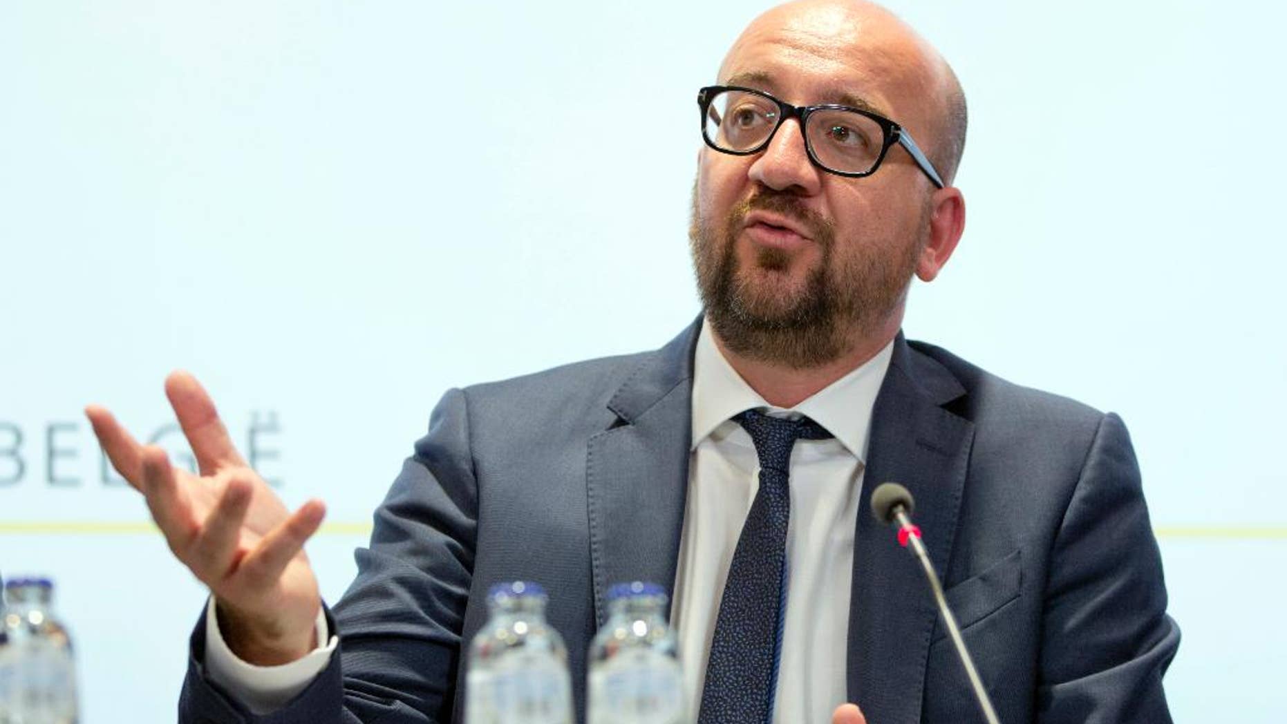 FILE - In this Sunday, Aug. 7, 2016 file photo, Belgian Prime Minister Charles Michel speaks during a media conference at the prime ministers office in Brussels. The small Belgian region of Wallonia is currently holding up the signature of a landmark free trade deal uniting over 500 million European Union citizens and 35 million Canadians. (AP Photo/Virginia Mayo, File)