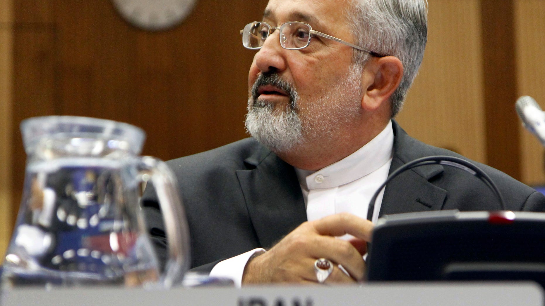 Iran's Ambassador to the International Atomic Energy Agency, IAEA, Ali Asghar Soltanieh waits for the start of the IAEA board of governors meeting at the International Center, in Vienna, Austria, on Wednesday, Sept. 14, 2011.