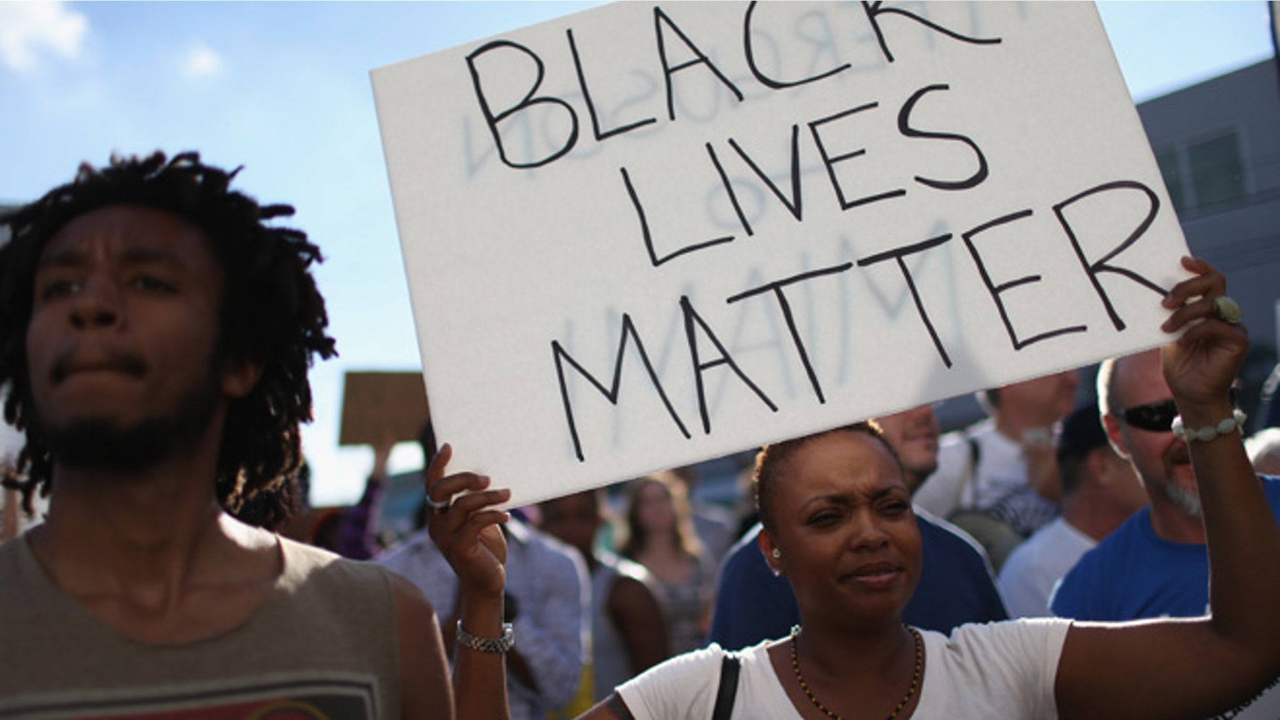 MIAMI, FL - DECEMBER 07: Demonstrators march through the Wynwood neighborhood as they protest police abuse on December 7, 2014 in Miami, Florida. The protest was one of many that have take place nationwide after grand juries investigating the deaths of Michal Brown in Ferguson, Missouri and Eric Garner in New York failed to indict the police officers involved in both incidents (Photo by Joe Raedle/Getty Images)