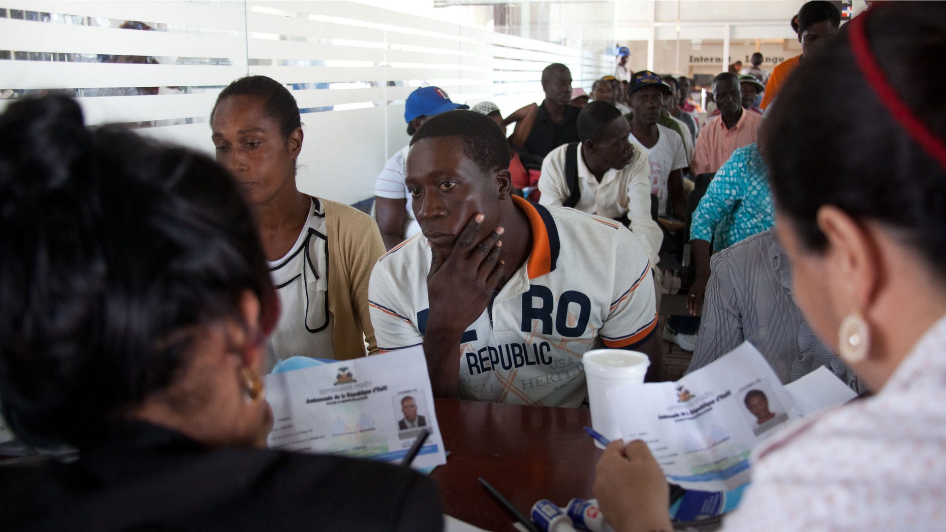 A Haitian man registers for legal residency at the Interior Ministry in Santo Domingo, Dominican Republic, Tuesday, June 16, 2015. Army Gen. Rubel Paulino says those who havenât registered by Thursday âwill be repatriated,â which conflicts with statements by Interior Minister Ramon Fadul that there will be no mass deportations. (AP Photo/Tatiana Fernandez)