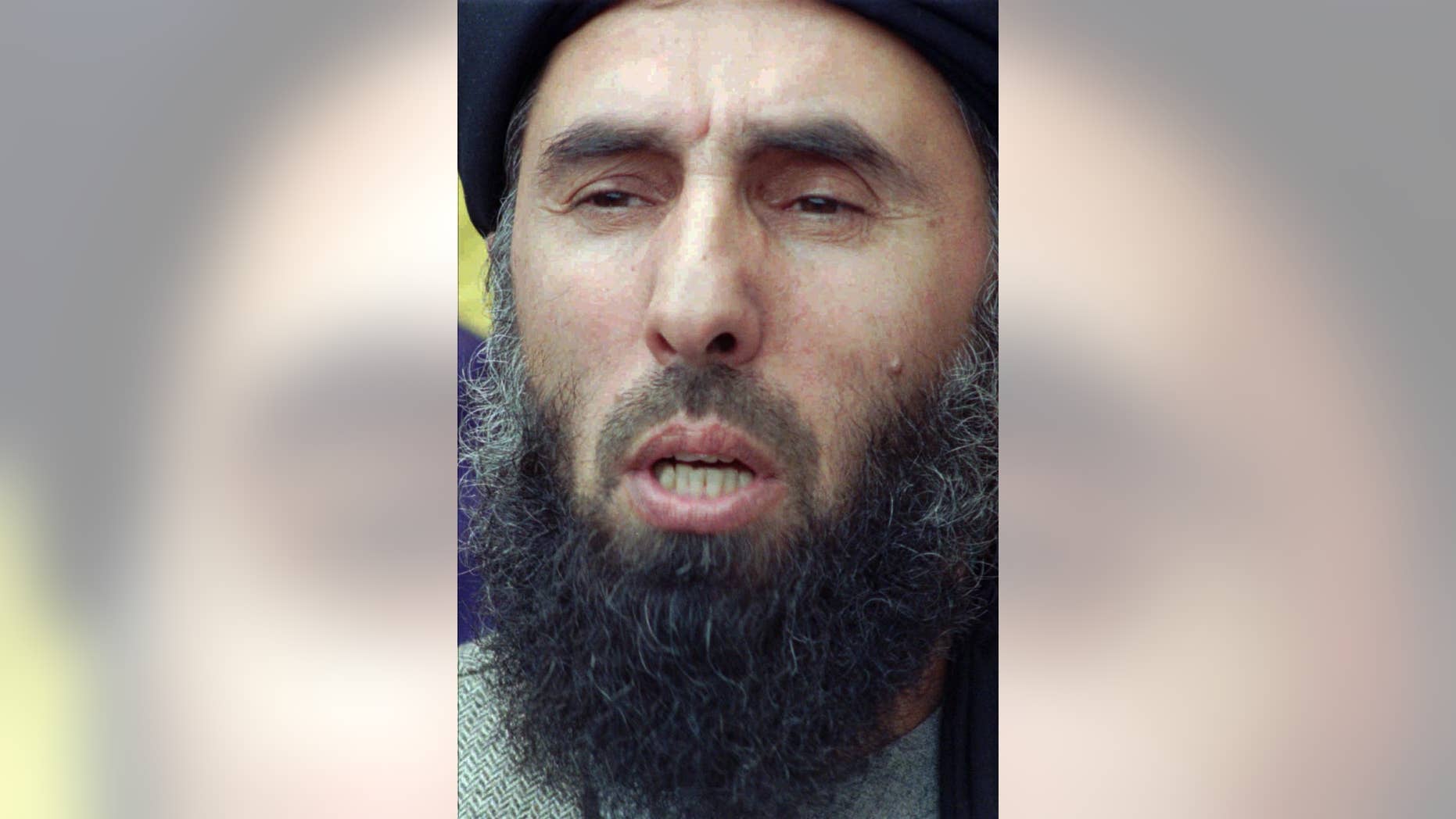 FILE -- In this Feb. 13, 1996 file photo Gulbuddin Hekmatyar, Chief of Hezb-i-Islami Afghanistan addresses a news conference in Islamabad, Pakistan. The former Afghan warlord has announced that a much-touted peace deal between his militant group and the Kabul government is effectively "dead." (AP Photo/B.K. Bangash)