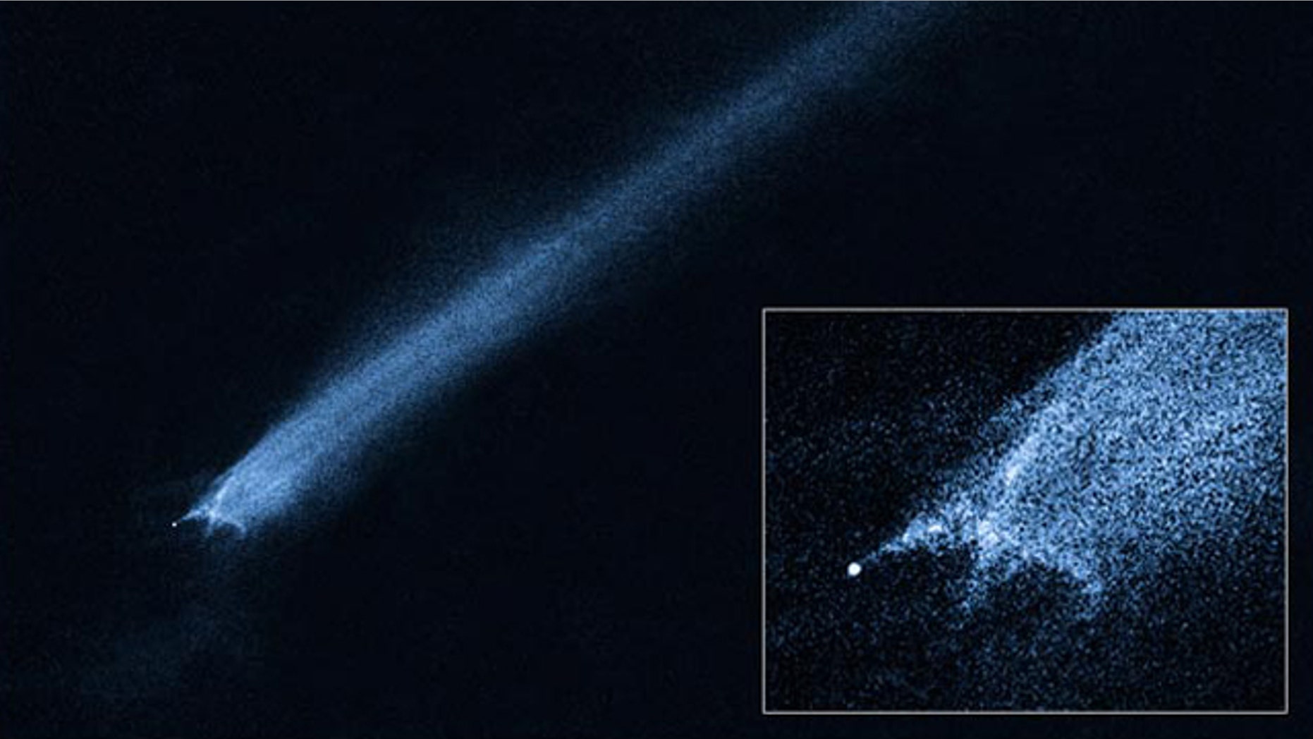 A Hubble Space Telescope picture of a comet-like object called P/2010 A2 shows a bizarre X-pattern of filamentary structures near the point-like nucleus of the object and trailing streamers of dust. Scientists think the object is the remnant of an asteroid collision.
