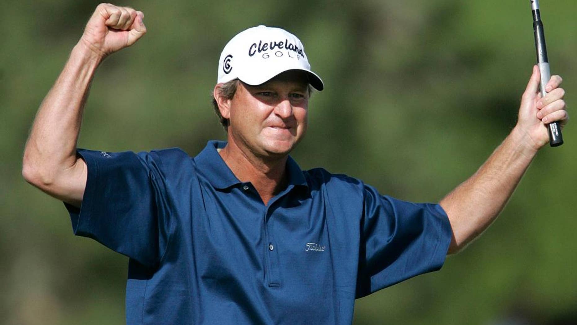FILE - In this Sunday, Oct. 16, 2005 file photo, Wes Short Jr. reacts after sinking a birdie putt on the 18th hole to face Jim Furyk in the playoff during the final day of Michelin Championship in Las Vegas. Short first tried to qualify for the U.S. Open when he was a high school senior in Texas. He finally made it 34 years later at age 52. The U.S. Open is June 16-19, 2016 at Oakmont (AP Photo/Jae C. Hong, File)