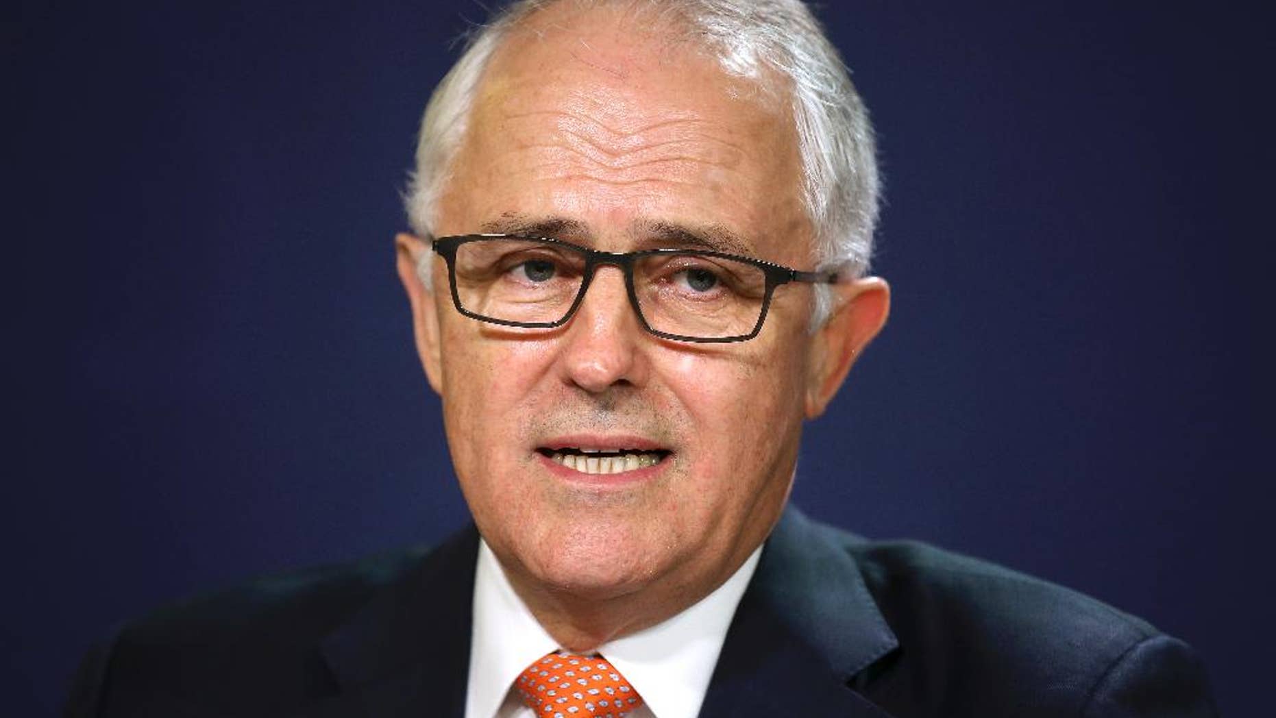 FILE - In this July 10, 2016 file photo, Australian Prime Minister Malcolm Turnbull speaks at the government offices in Sydney. Turnbull came under pressure from his own lawmakers on Thursday, July 14 to revise his economic agenda after his weakened coalition scraped through one of the nation's closest ever elections. (AP Photo/Rick Rycroft, File)