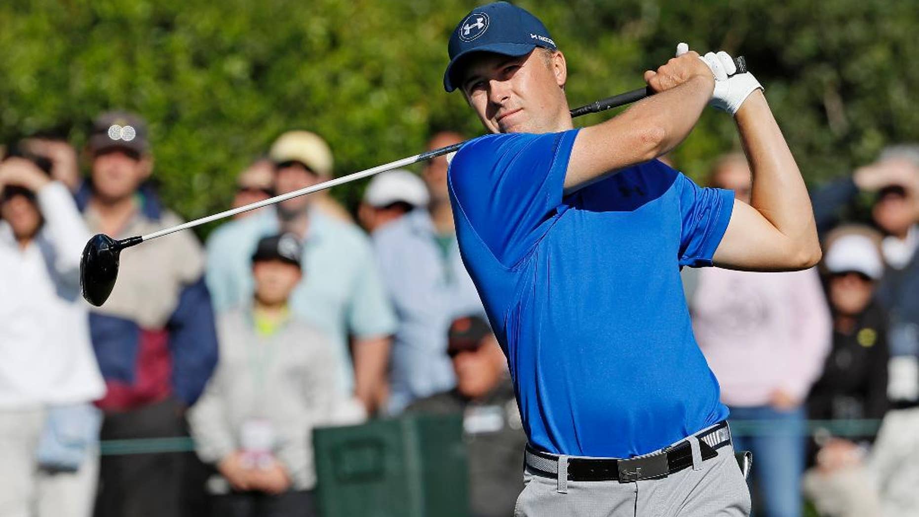 FILE - In this Friday, April 8, 2016 file photo, Jordan Spieth tees off on the 15th hole during the second round of the Masters golf tournament in Augusta, Ga. Jordan Spieth understands his meltdown at the end of the Masters will follow him. And three weeks later Spieth’s not quite ready to say he’s over letting a five-shot in the final round morph into that awkward ceremony in the Butler Cabin that ended with him slipping the green jacket on Danny Willett following an ugly and very public collapse.(AP Photo/David J. Phillip, File)
