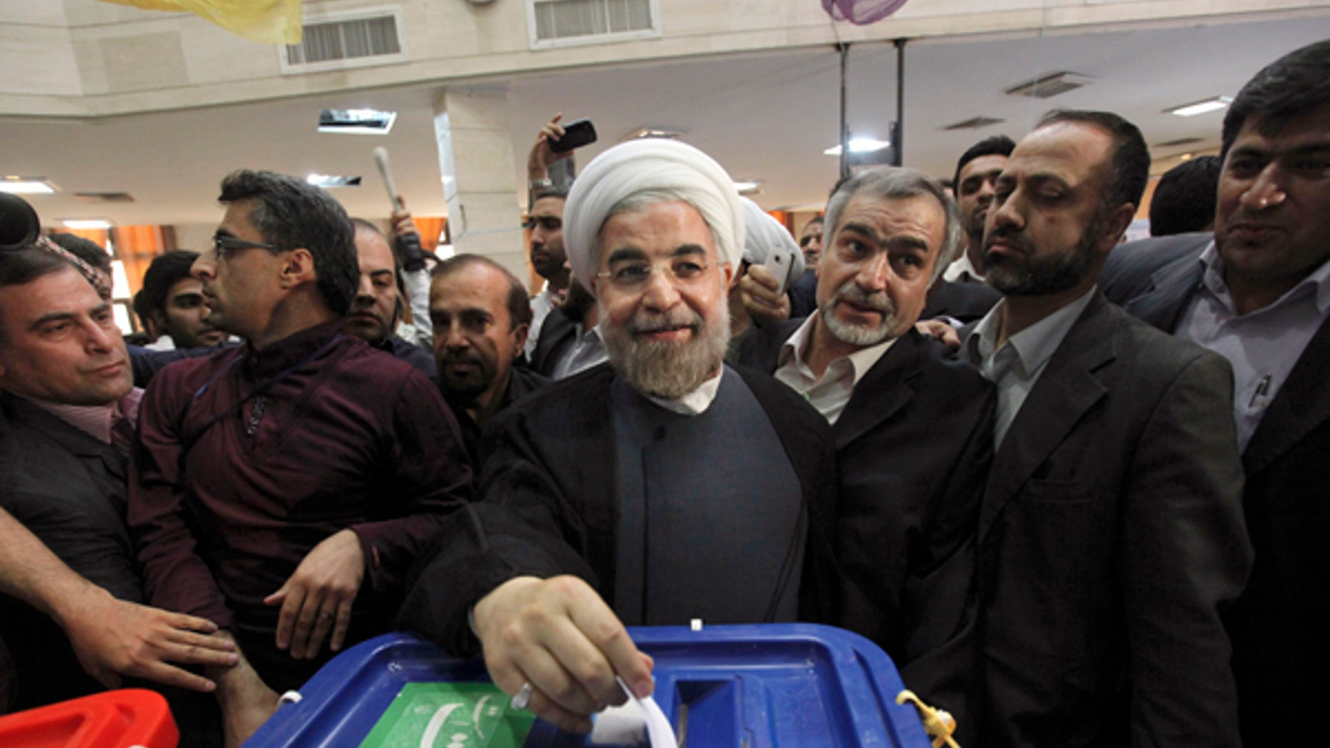 Iranian President Hasan Rowhani ran as a moderate, and the release of 11 political prisoners could be evidence of a shift in Iran. (AP)