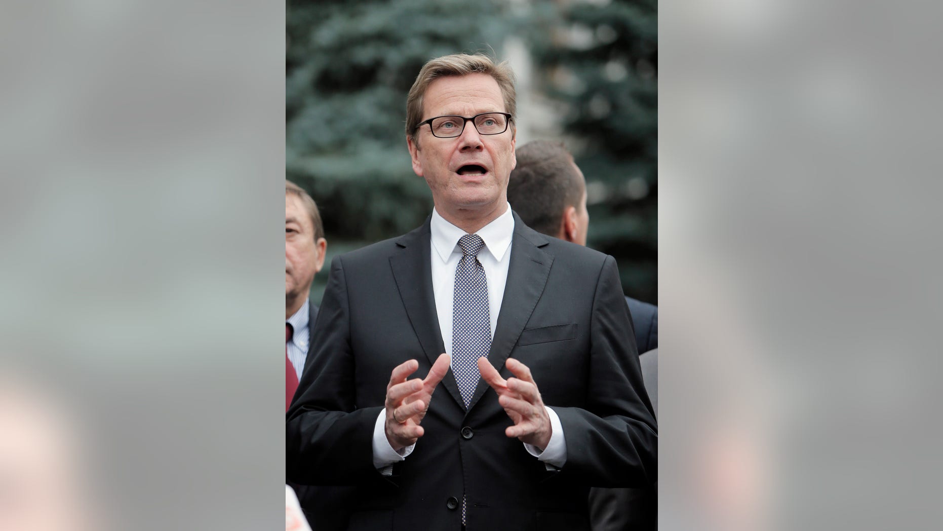 German Foreign Minister Guido Westerwelle speaks to media after his meeting with Ukrainian President Viktor Yanukovich in Kiev, Ukraine, Thursday, Oct. 10, 2013. (AP Photo/Efrem Lukatsky)