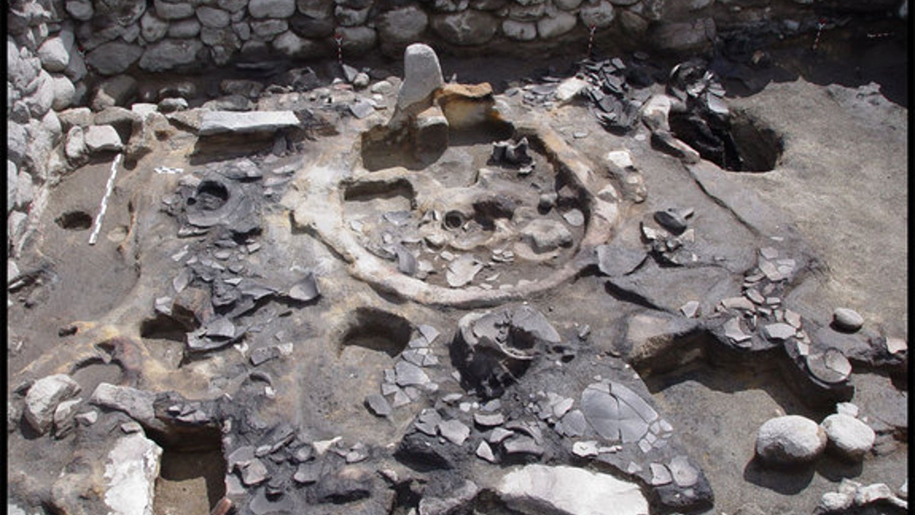 A shrine excavated at the entrance of a fortress' west terrace in Gegharot in Armenia. The stone stele like would've been a focal point for rituals practiced there some 3,300 years ago.