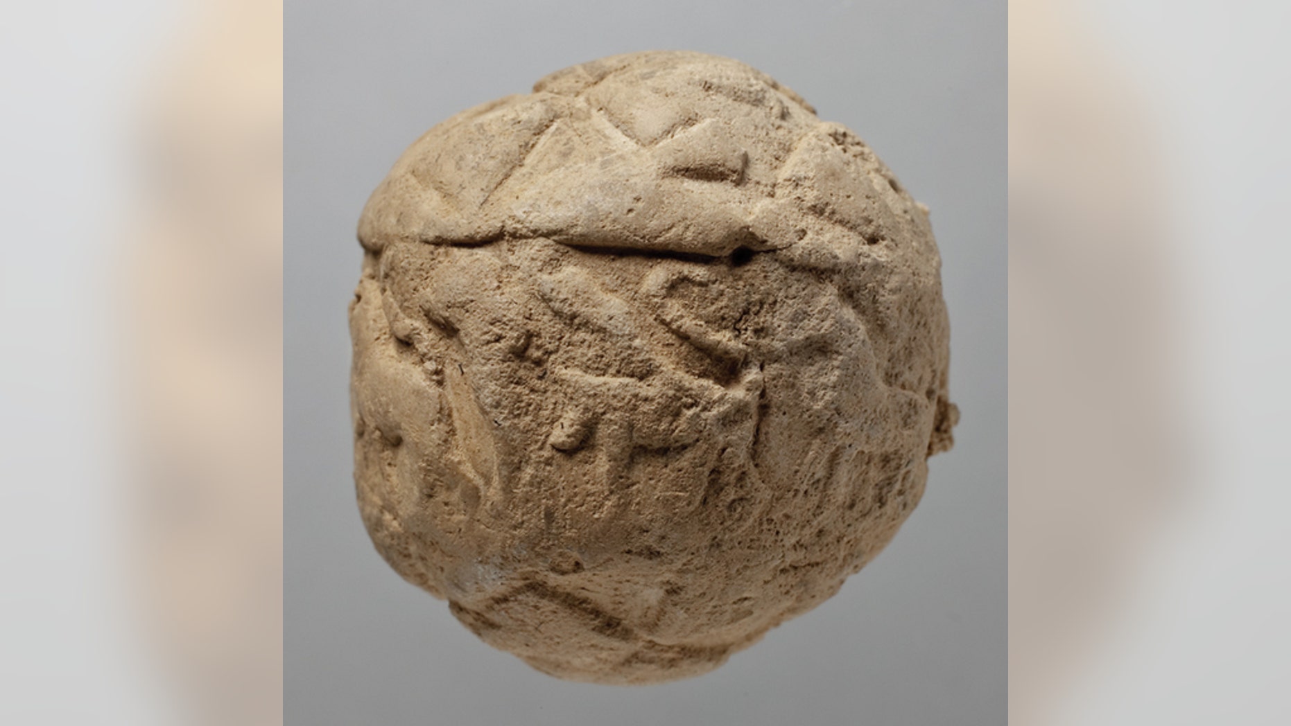 Archaeologists are using CT scanning and 3D modelling to crack a lost prehistoric code hidden inside clay balls, dating to some 5,500 years ago, found in Mesopotamia.