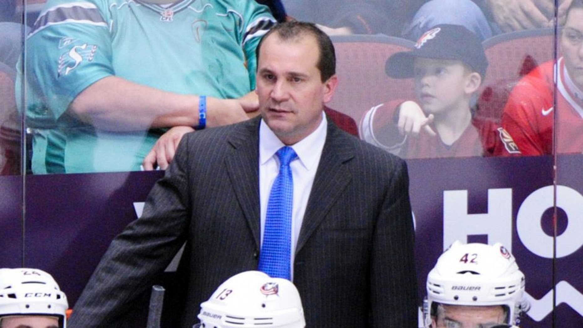 Jan 2, 2014; Glendale, AZ, USA; Columbus Blue Jackets head coach Todd Richards looks on during the second period against the Phoenix Coyotes at Jobing.com Arena. Mandatory Credit: Matt Kartozian-USA TODAY Sports