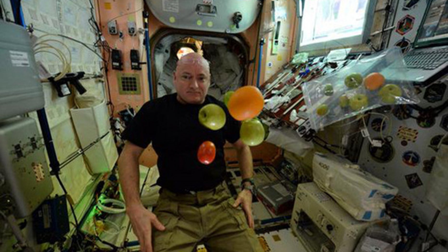 Astronaut Scott Kelly enjoys fresh fruit on Day 100 of his one-year trip aboard the International Space Station. This week Kelly talked with reporters about what life is like in orbit.
