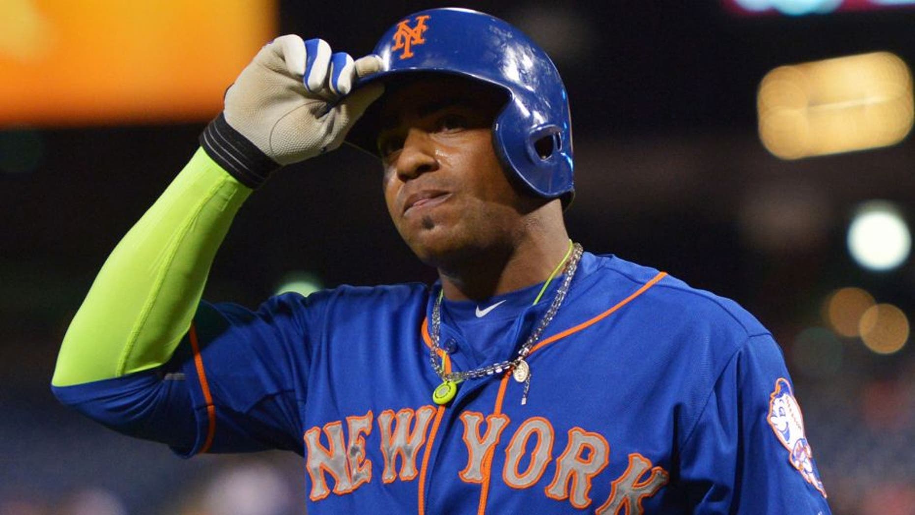 PHILADELPHIA, PA - SEPTEMBER 30: Yoenis Cespedes #52 of the New York Mets walks to the dugout after getting hit by a pitch in the third inning during the game against the Philadelphia Phillies at Citizens Bank Park on September 30, 2015 in Philadelphia, Pennsylvania. (Photo by Drew Hallowell/Getty Images)