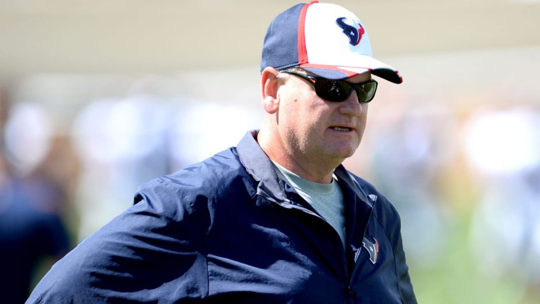 Aug 20, 2014; Englewood, CO, USA; Houston Texans offensive line coach Paul Dunn before the start of a scrimmage against the Denver Broncos at the Broncos training facility. Mandatory Credit: Ron Chenoy-USA TODAY Sports