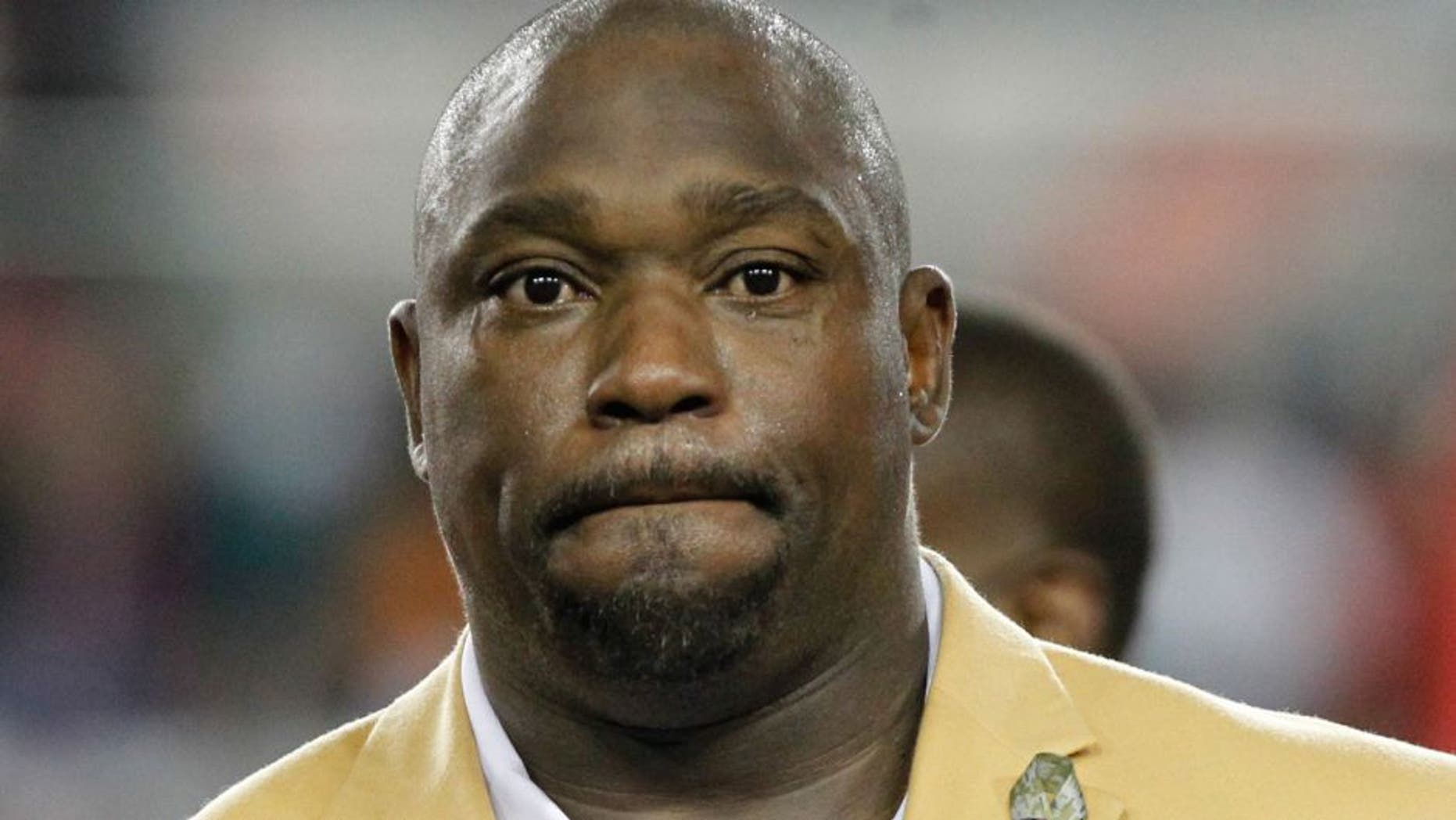 Nov 11, 2013; Tampa, FL, USA; Tampa Bay Buccaneers hall of famer Warren Sapp talks as he is inducted into the Ring of Honor at halftime against the Miami Dolphins at Raymond James Stadium. Mandatory Credit: Kim Klement-USA TODAY Sports