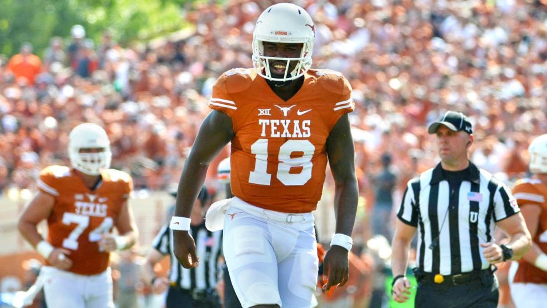 Sep 26, 2015; Austin, TX, USA; Texas Longhorns quarterback Tyrone Swoopes (18) reacts against the Oklahoma State Cowboys during the second quarter at Darrell K Royal-Texas Memorial Stadium. Mandatory Credit: Brendan Maloney-USA TODAY Sports
