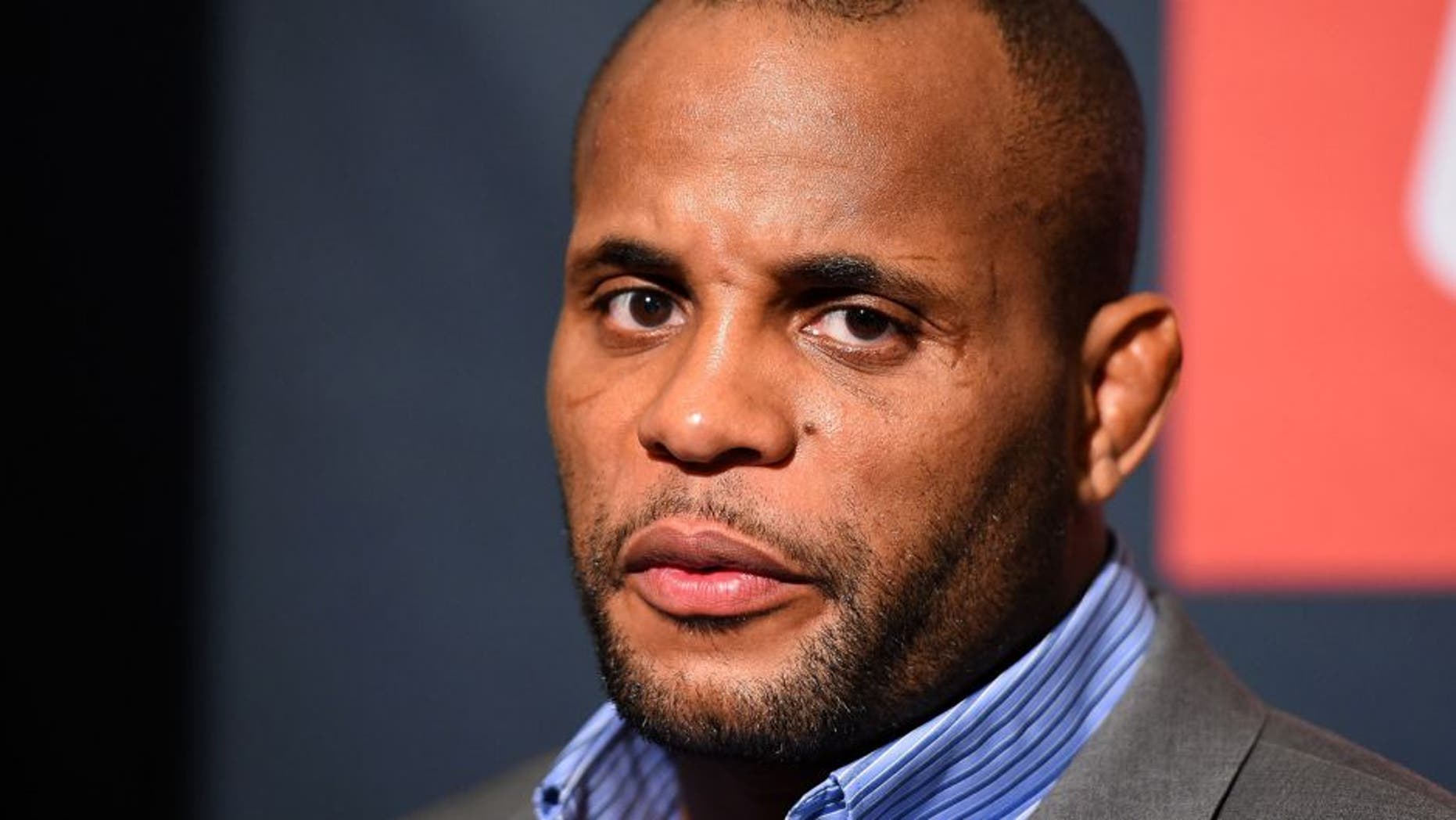 HOUSTON, TX - OCTOBER 01: UFC light heavyweight champion Daniel Cormier interacts with media during the UFC 192 Ultimate Media Day at the Toyota Center on October 1, 2015 in Houston, Texas. (Photo by Josh Hedges/Zuffa LLC/Zuffa LLC via Getty Images)