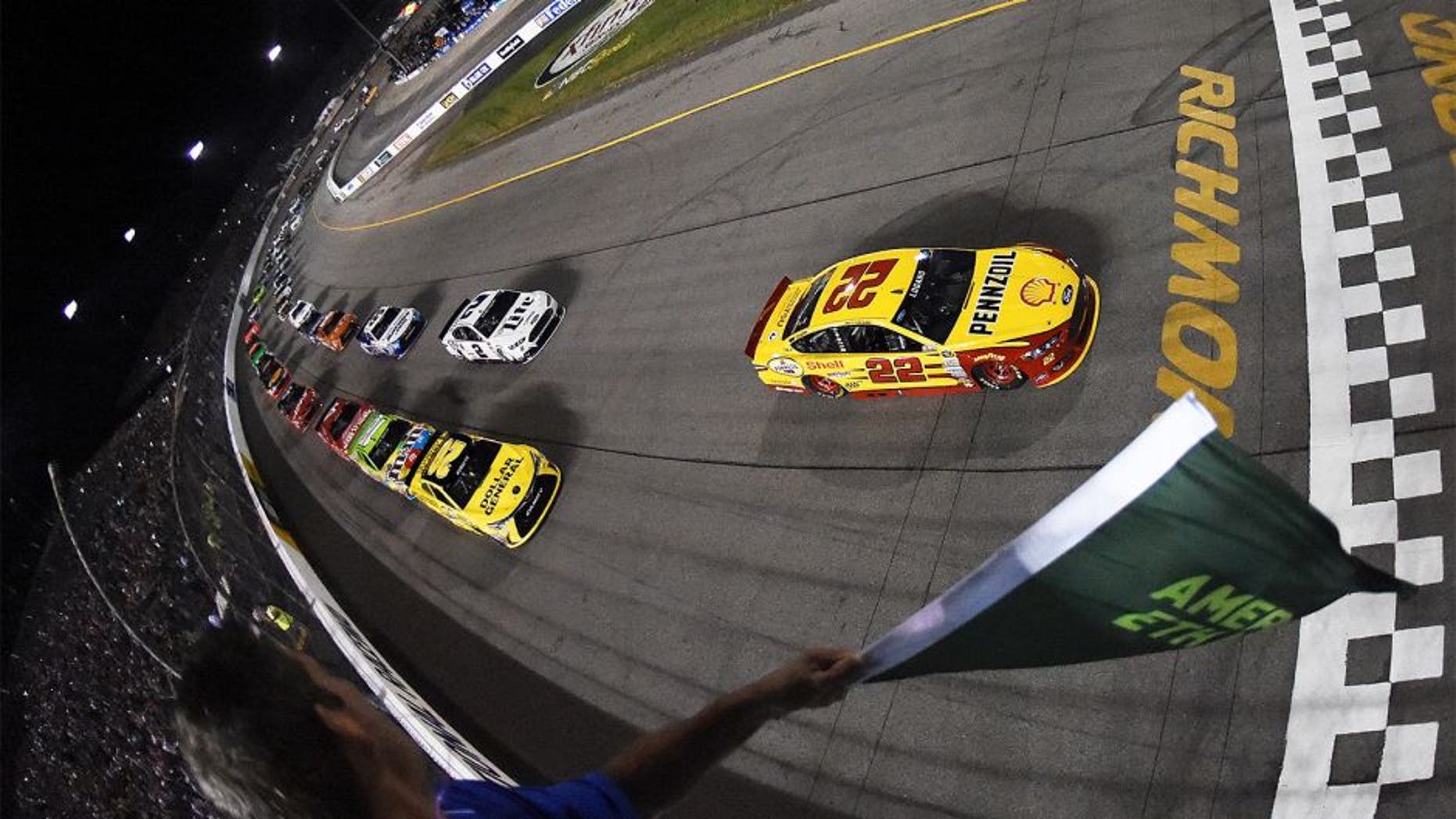 RICHMOND, VA - SEPTEMBER 12: Joey Logano, driver of the #22 Shell Pennzoil Ford, leads the field to the green flag to start the NASCAR Sprint Cup Series Federated Auto Parts 400 at Richmond International Raceway on September 12, 2015 in Richmond, Virginia. (Photo by Rainier Ehrhardt/NASCAR via Getty Images)