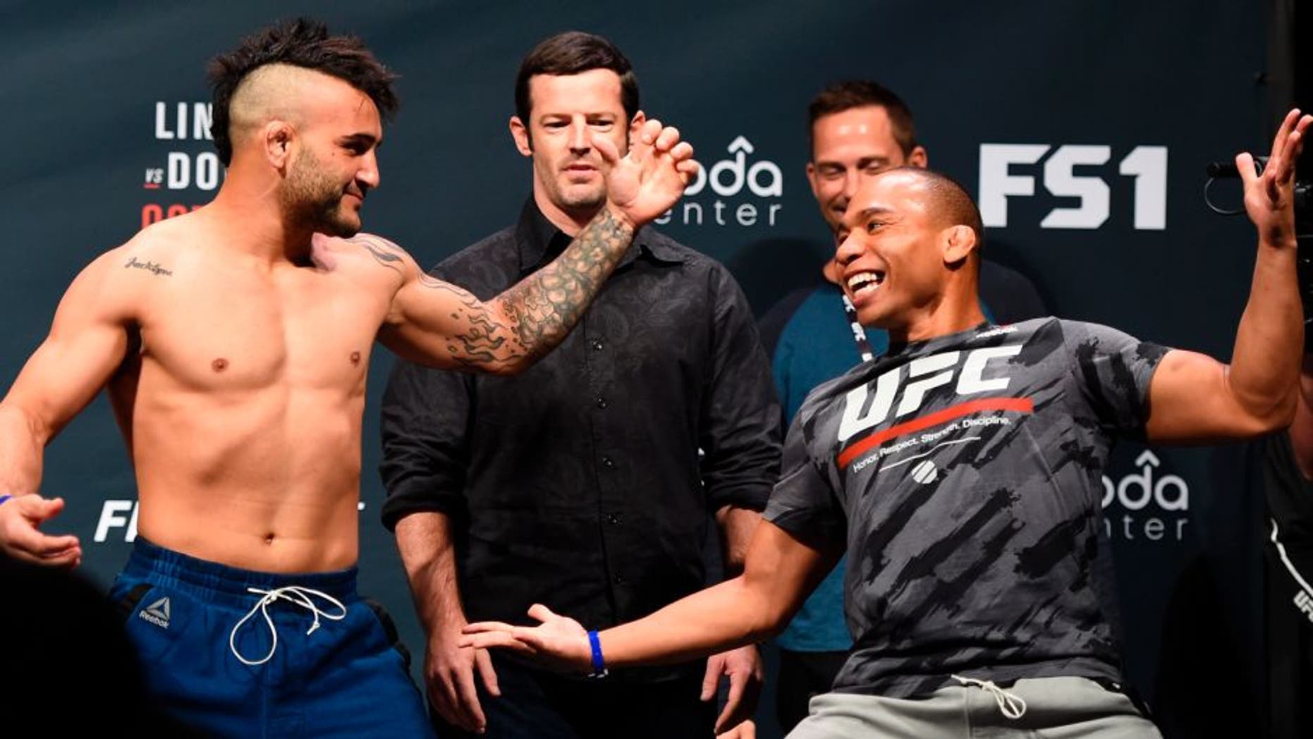 PORTLAND, OR - SEPTEMBER 30: (L-R) John Lineker of Brazil and John Dodson face-off during the UFC Fight Night weigh-in at the Oregon Convention Center on September 30, 2016 in Portland, Oregon. (Photo by Josh Hedges/Zuffa LLC/Zuffa LLC via Getty Images)