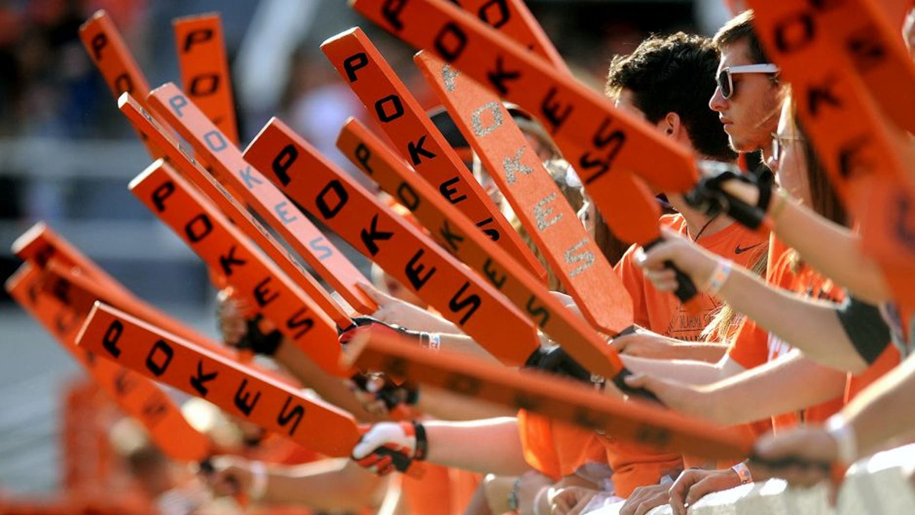 Sep 13, 2014; Stillwater, OK, USA; Oklahoma State Cowboys fans wave show their spirit prior to action against the Texas-San Antonio Roadrunners at Boone Pickens Stadium. Mandatory Credit: Mark D. Smith-USA TODAY Sports