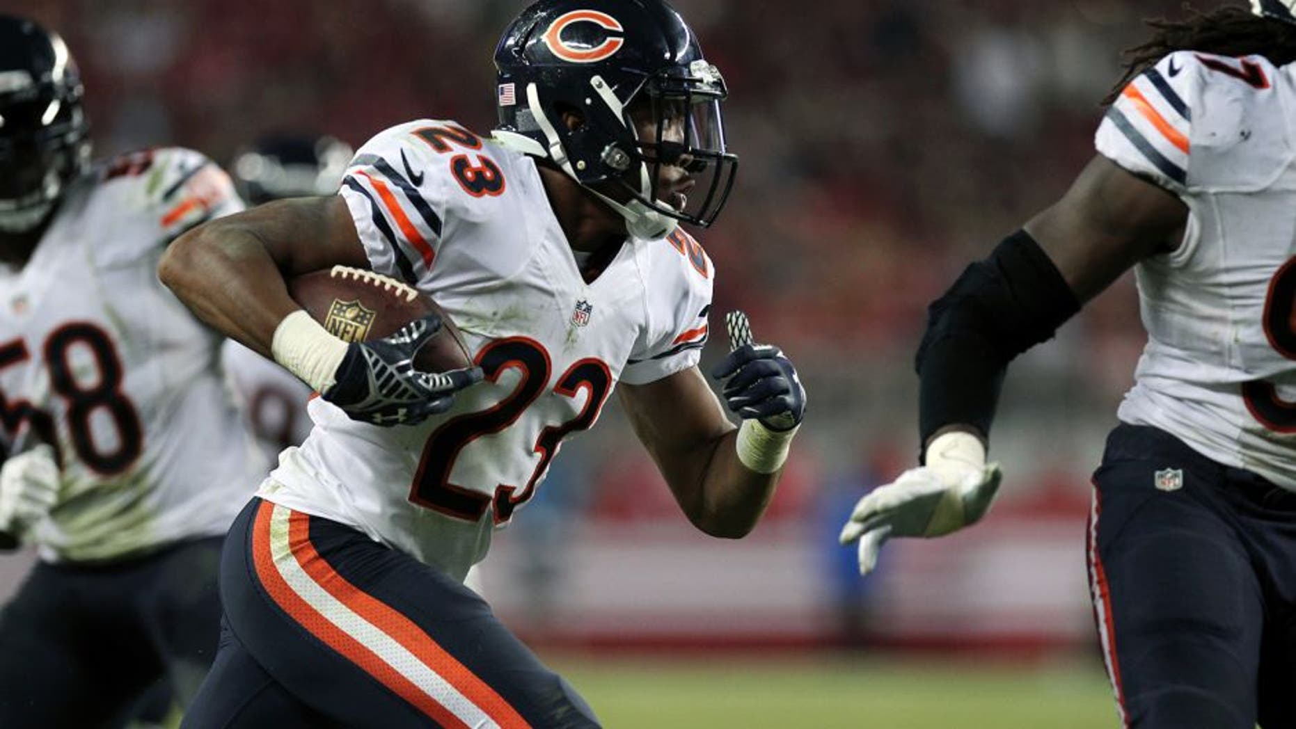 Sep 14, 2014; Santa Clara, CA, USA; Chicago Bears Kyle Fuller (23) runs after intercepting San Francisco 49ers quarterback Colin Kaepernick (7) (not pictured) in the fourth quarter of their NFL football game at Levis Stadium. Mandatory Credit: Lance Iversen-USA TODAY Sports