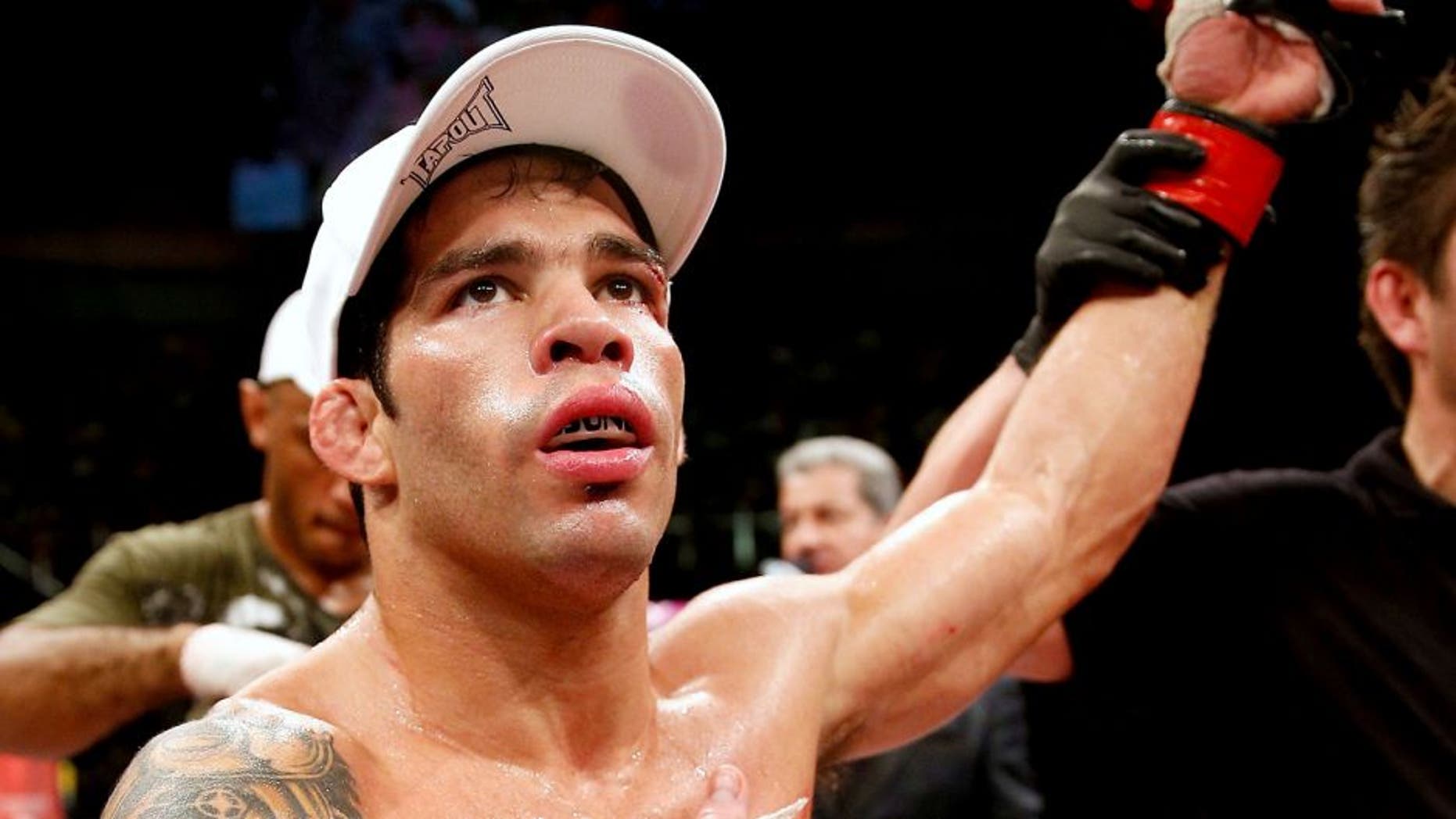 FORTALEZA, BRAZIL - JUNE 08: Raphael Assuncao reacts after his submission victory over Vaughan Lee in their bantamweight fight during the UFC on FUEL TV event at Paulo Sarasate Arena on June 8, 2013 in Fortaleza, Ceara, Brazil. (Photo by Josh Hedges/Zuffa LLC/Zuffa LLC via Getty Images)