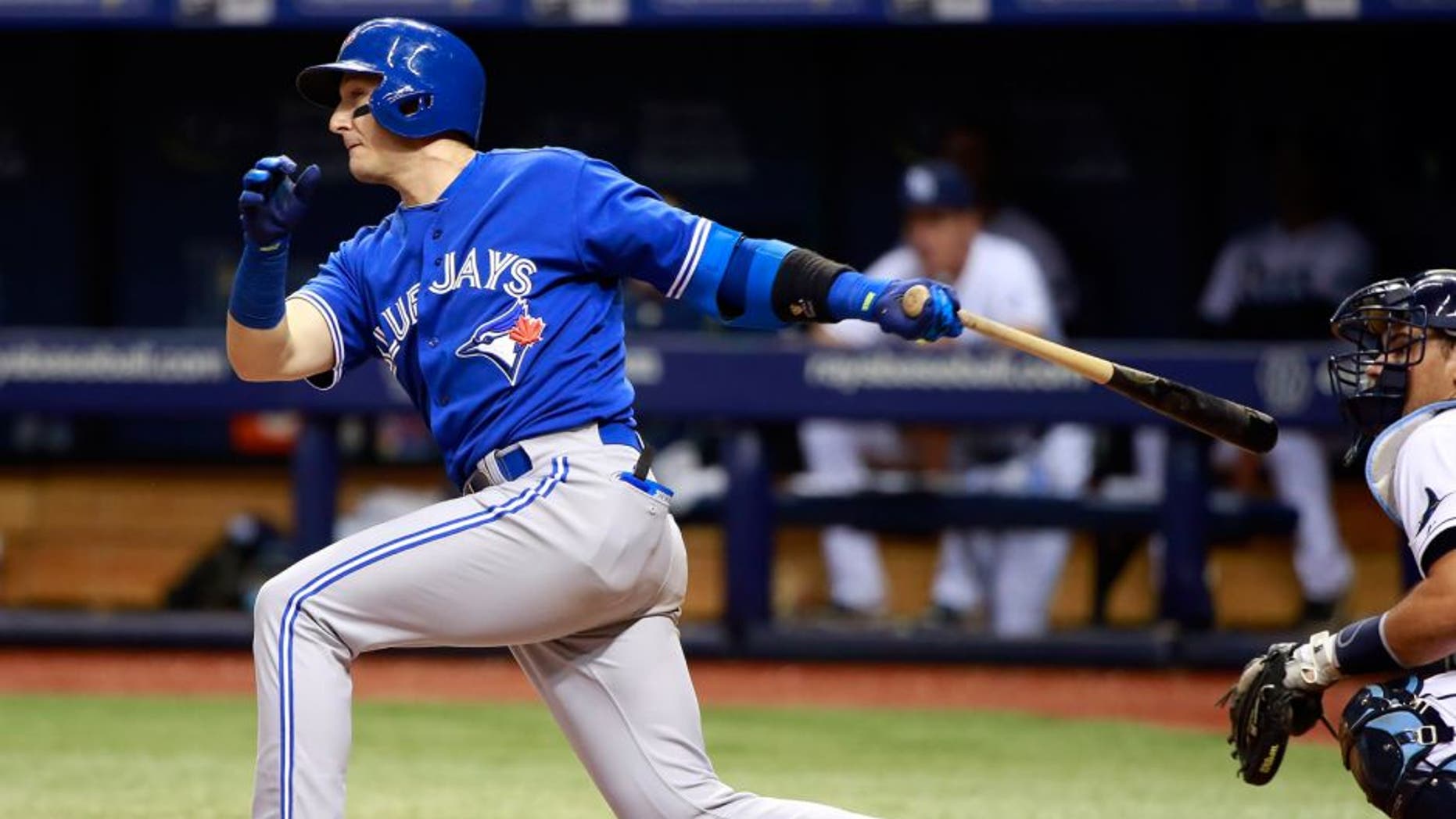 Oct 2, 2015; St. Petersburg, FL, USA; Toronto Blue Jays shortstop Troy Tulowitzki (2) singles during the sixth inning against the Tampa Bay Rays at Tropicana Field. Mandatory Credit: Kim Klement-USA TODAY Sports