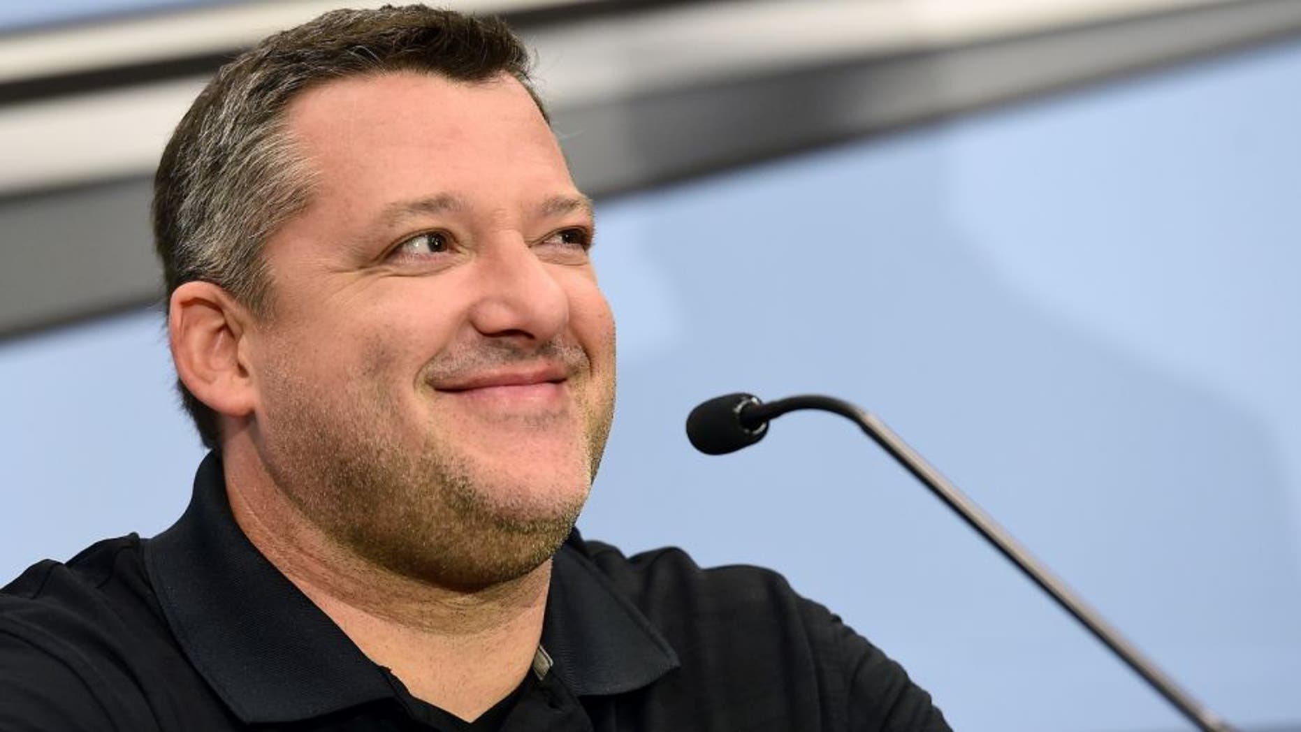 KANNAPOLIS, NC - SEPTEMBER 30: Tony Stewart, driver of the #14 Stewart-Haas Racing Chevrolet and co-owner of Stewart-Haas Racing, speaks with the media during a press conference announcing his retirement on September 30, 2015 in Kannapolis, North Carolina. Stewart has decided his 18th year in the NASCAR Sprint Cup Series will be his last. The three-time series champion will retire following the 2016 season, whereupon Clint Bowyer will take the wheel of the No. 14 machine beginning in 2017. (Photo by Jared C. Tilton/Stewart-Haas Racing via Getty Images)