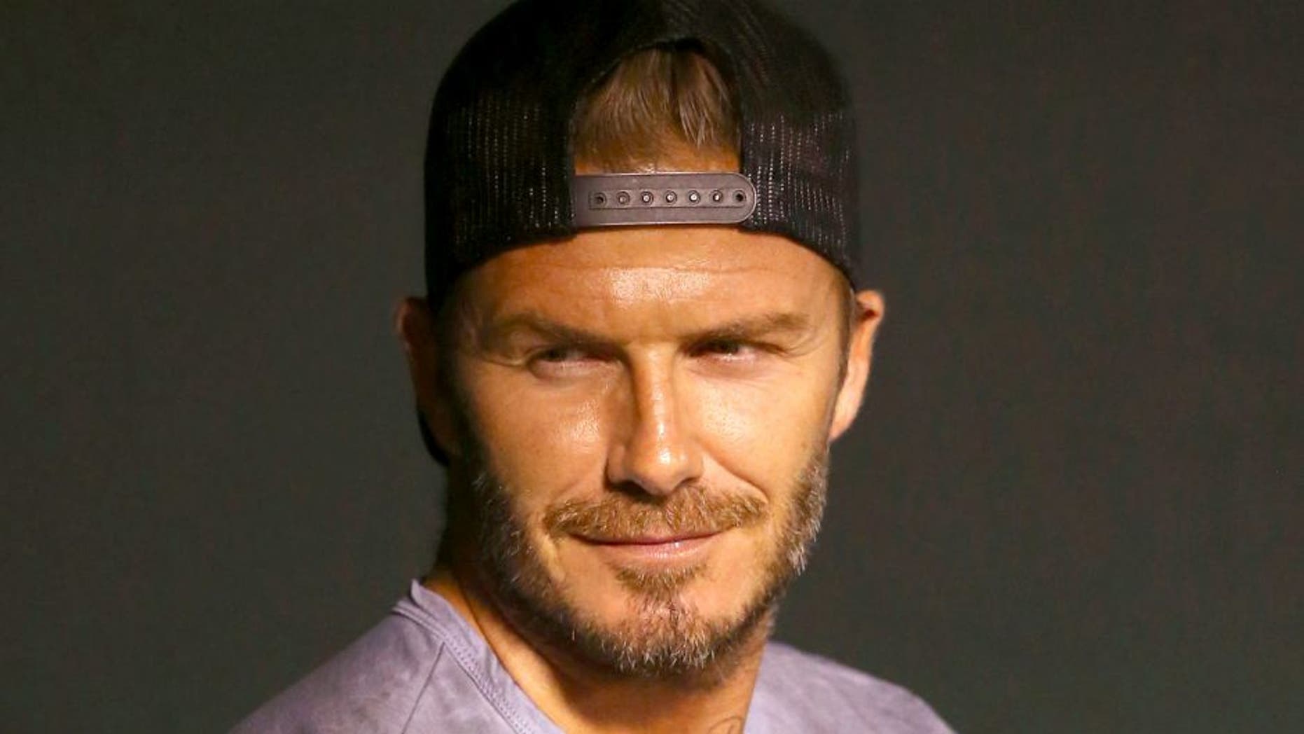 ANAHEIM, CA - AUGUST 20: Former professional soccer player David Beckham attends the MLB game between the Chicago White Sox and the Los Angeles Angels of Anaheim at Angel Stadium of Anaheim on August 20, 2015 in Anaheim, California. The White Sox defeated the Angels 8-2. (Photo by Victor Decolongon/Getty Images)