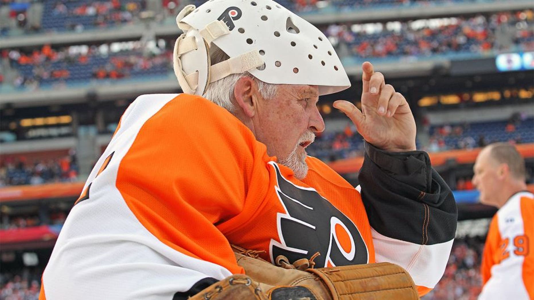 PHILADELPHIA, PA - DECEMBER 31: Bernie Parent #1 of the Philadelphia Flyers looks on during warmups prior to his game against the New York Rangers during the Alumni Game prior to the 2012 NHL Bridgestone Winter Classic on December 31, 2011 at Citizens Bank Park in Philadelphia, Pennsylvania. (Photo by Len Redkoles/NHLI via Getty Images)