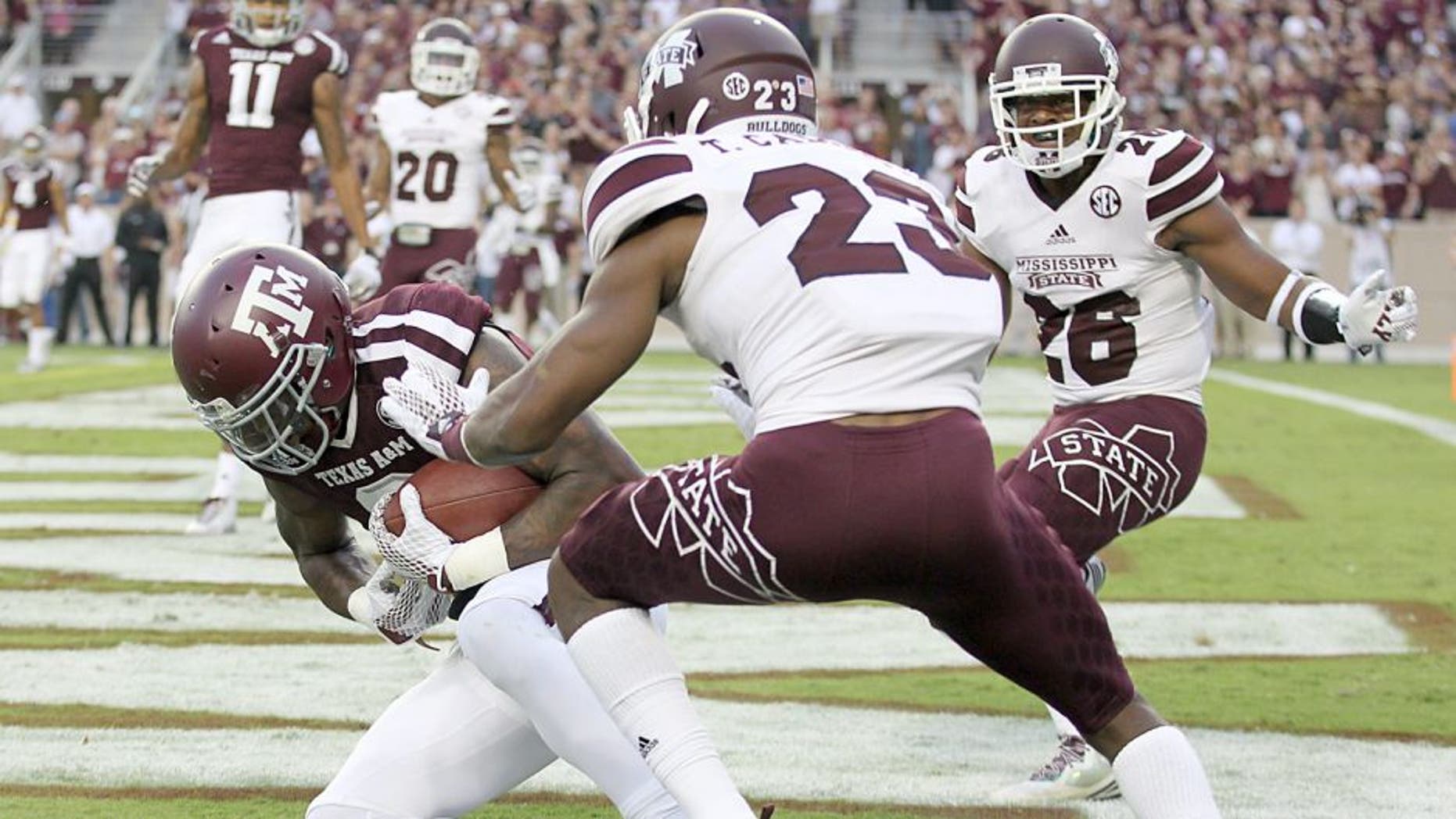 COLLEGE STATION, TX - OCTOBER 03: Ricky Seals-Jones #9 of the Texas A&M Aggies catches a touchdown pass while being defended by Taveze Calhoun #23 of the Mississippi State Bulldogs in the first quarter on October 3, 2015 at Kyle Field in College Station, Texas. (Photo by Thomas B. Shea/Getty Images)