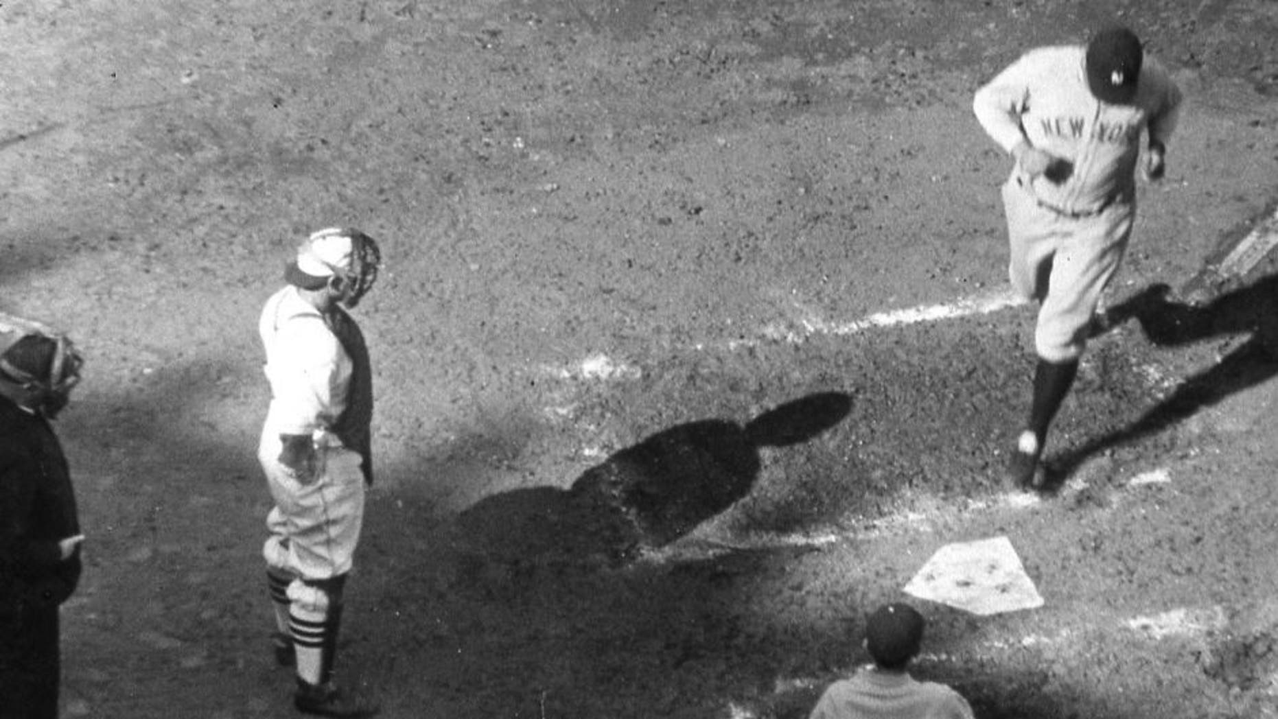NEW YORK - October 6, 1926. Babe Ruth is crossing the plate after hitting his third home run on October 11, 1926 in the fourth game of the World Series in St. Louis. Bob O'Farrell is the Cardinals catcher. (Photo by Mark Rucker/Transcendental Graphics, Getty Images) *** Local Caption *** Babe Ruth;Bob O'Farrell