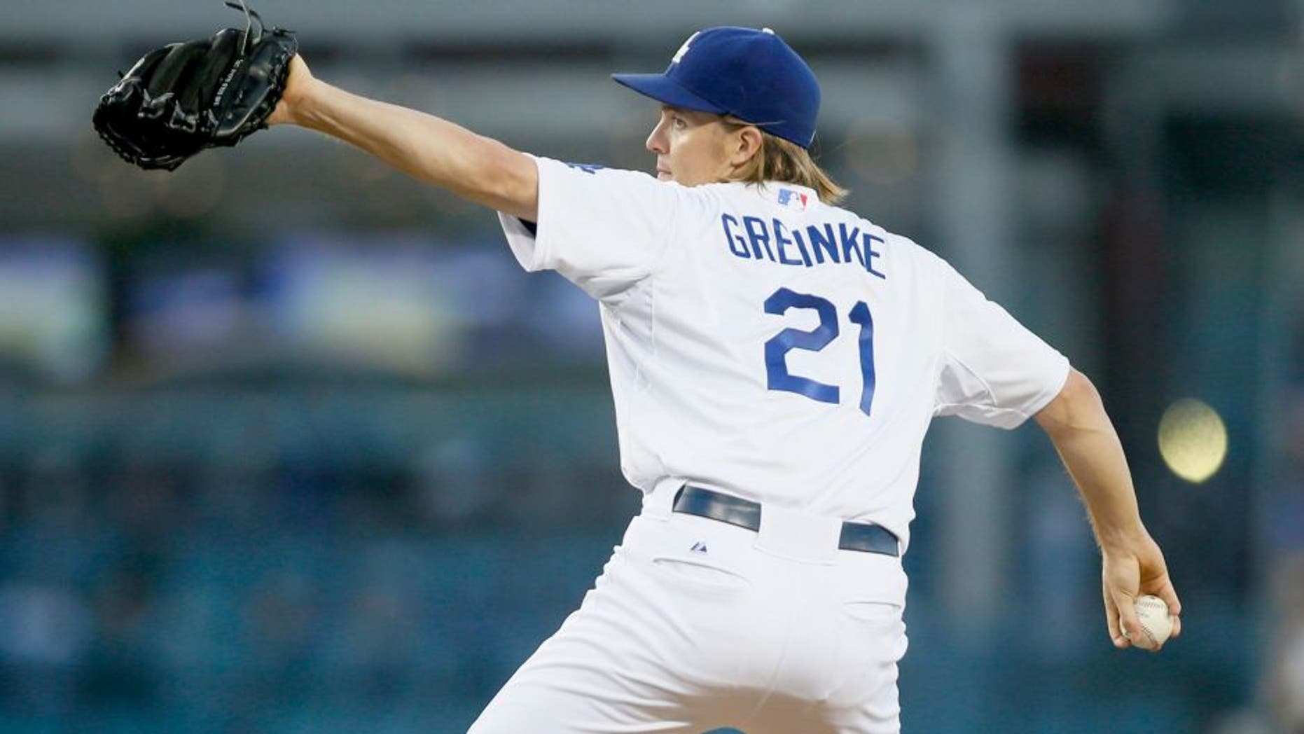 Los Angeles Dodgers starting pitcher Zack Greinke delivers against the San Diego Padres during the second inning of a baseball game Saturday, Oct. 3, 2015, in Los Angeles. (AP Photo/Danny Moloshok)