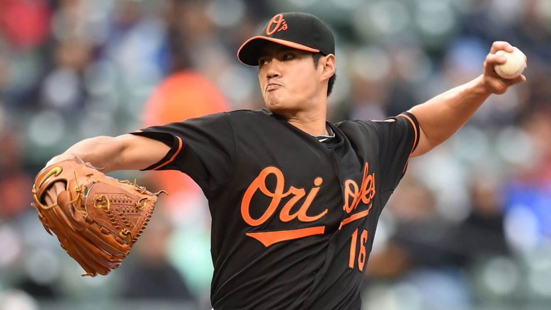 BALTIMORE, MD - OCTOBER 03: Wei-Yin Chen #16 of the Baltimore Orioles pitches in third inning during game one of a baseball game against the New York Yankees at Oriole Park at Camden Yards on October 3, 2015 in Baltimore, Maryland. (Photo by Mitchell Layton/Getty Images)