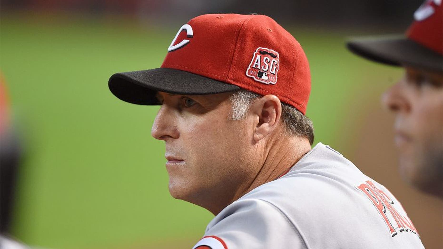 PHOENIX, AZ - AUGUST 09: Manager Bryan Price #38 of the Cincinnati Reds looks on from the bench against the Arizona Diamondbacks at Chase Field on August 9, 2015 in Phoenix, Arizona. (Photo by Norm Hall/Getty Images)