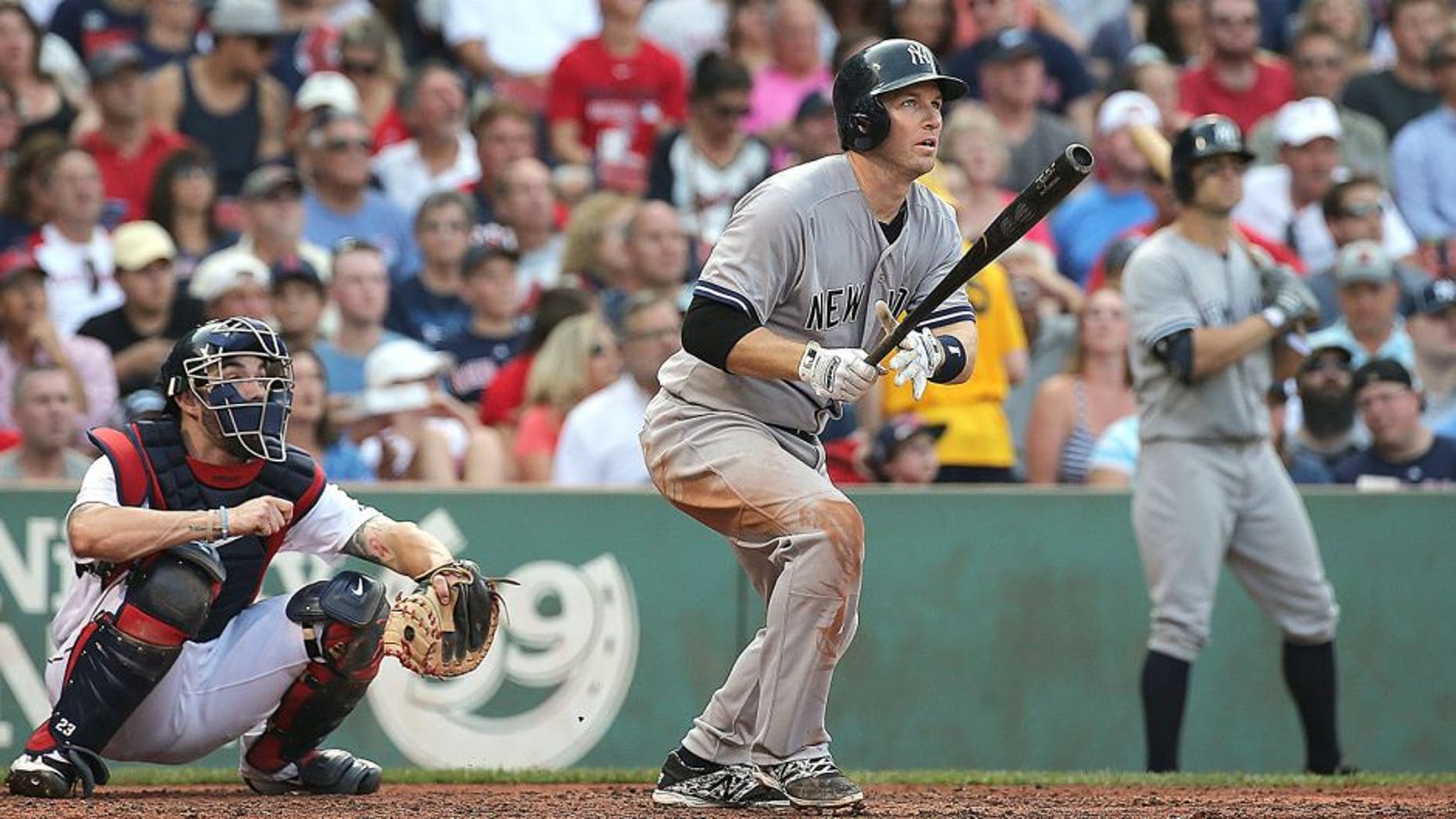BOSTON, MA - SEPTEMBER 2: Stephen Drew #14 of the New York Yankees hits a three-run home run in the third inning against he Boston Red Sox at Fenway Park on September 2, 2015 in Boston, Massachusetts. (Photo by Jim Rogash/Getty Images)