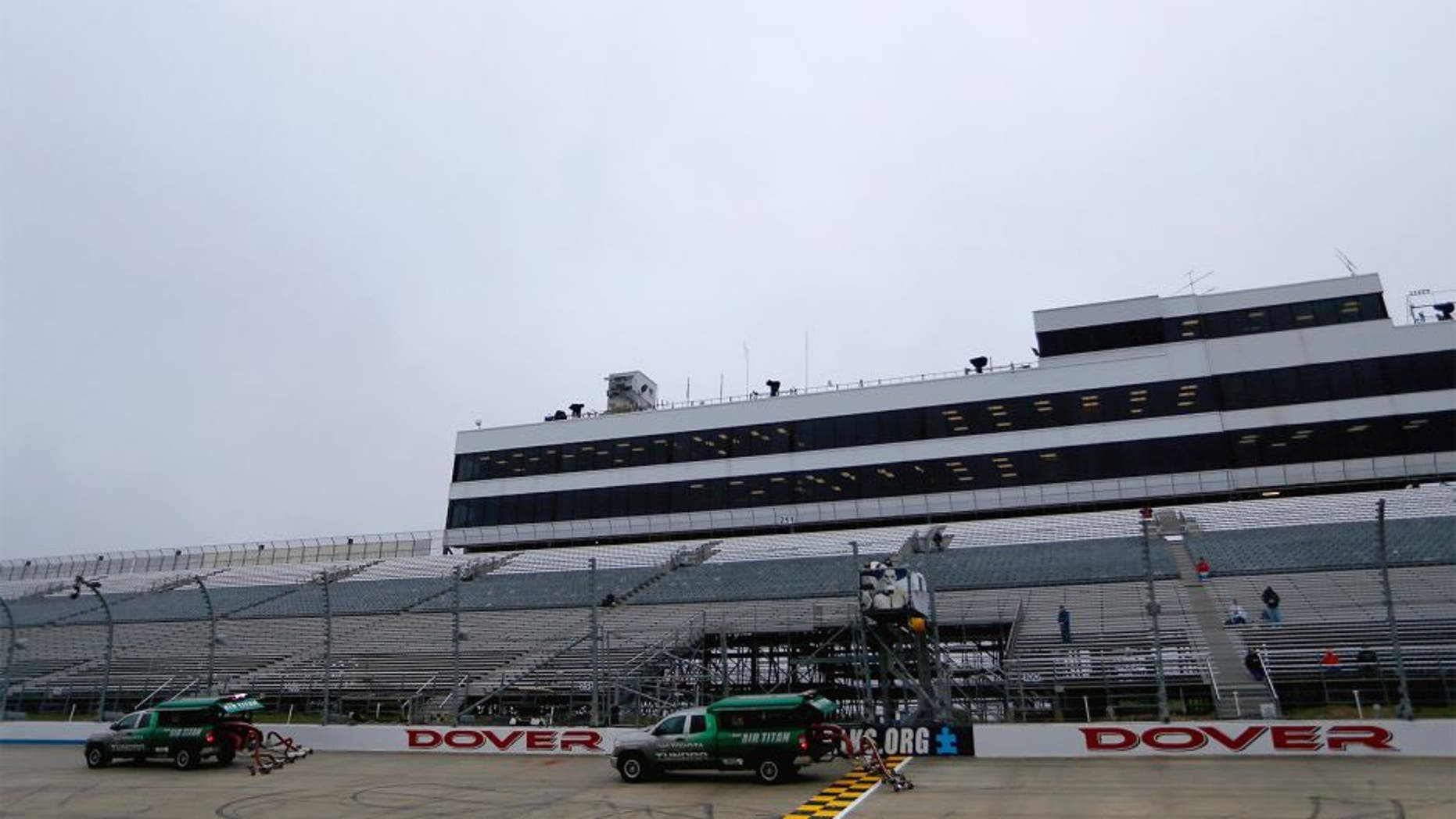 DOVER, DE - OCTOBER 03: A view of track workers drying the race track before practice for the NASCAR Sprint Cup Series AAA 400 at Dover International Speedway on October 3, 2015 in Dover, Delaware. (Photo by Jeff Zelevansky/NASCAR via Getty Images)