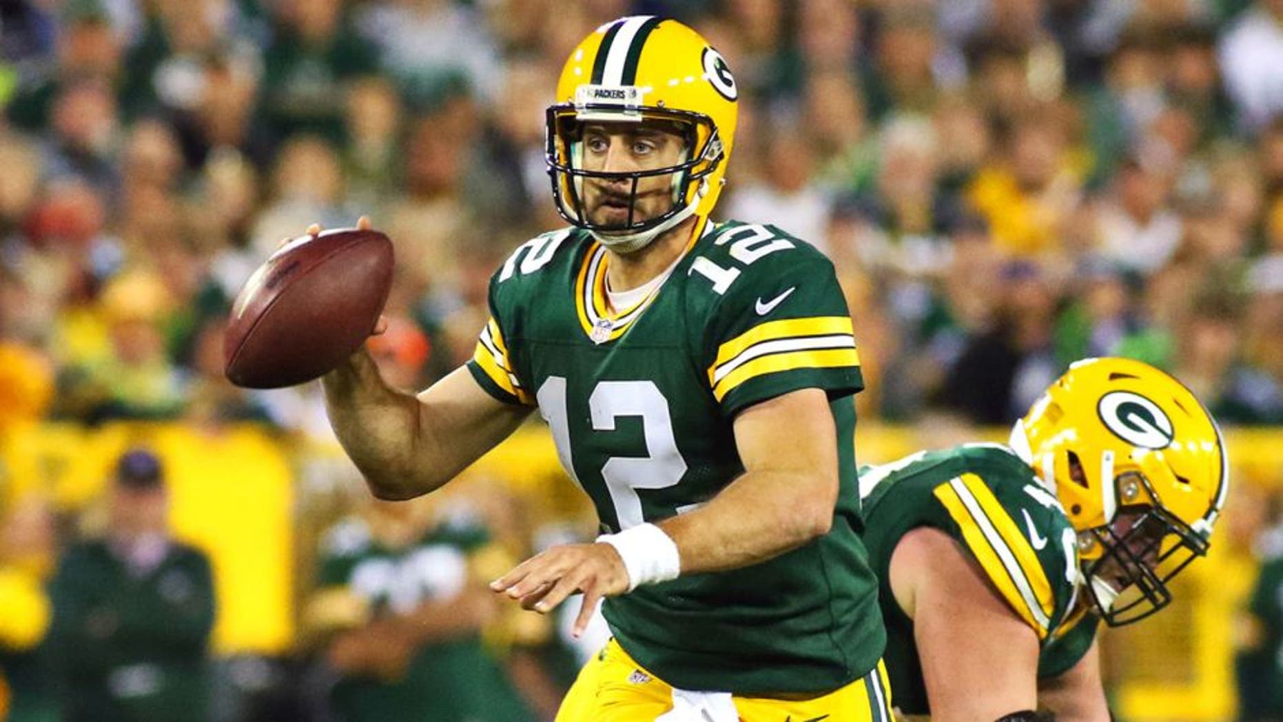 Sep 20, 2015; Green Bay, WI, USA; Green Bay Packers quarterback Aaron Rodgers (12) against the Seattle Seahawks during the second half at Lambeau Field. Packers won 27-17. Mandatory Credit: Ray Carlin-USA TODAY Sports
