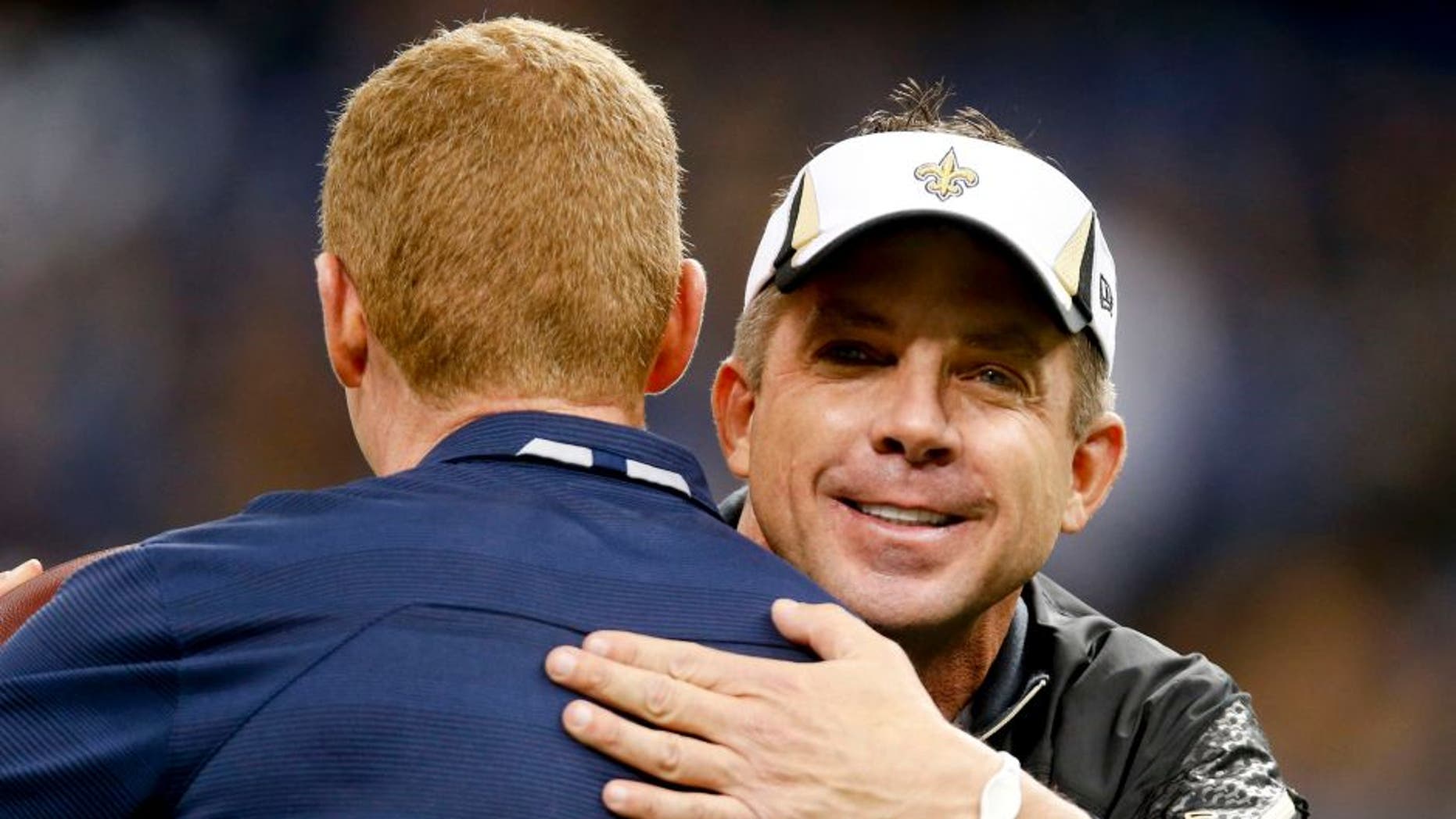 Nov 10, 2013; New Orleans, LA, USA; New Orleans Saints head coach Sean Payton greets Dallas Cowboys head coach Jason Garrett prior to a game at Mercedes-Benz Superdome. Mandatory Credit: Derick E. Hingle-USA TODAY Sports