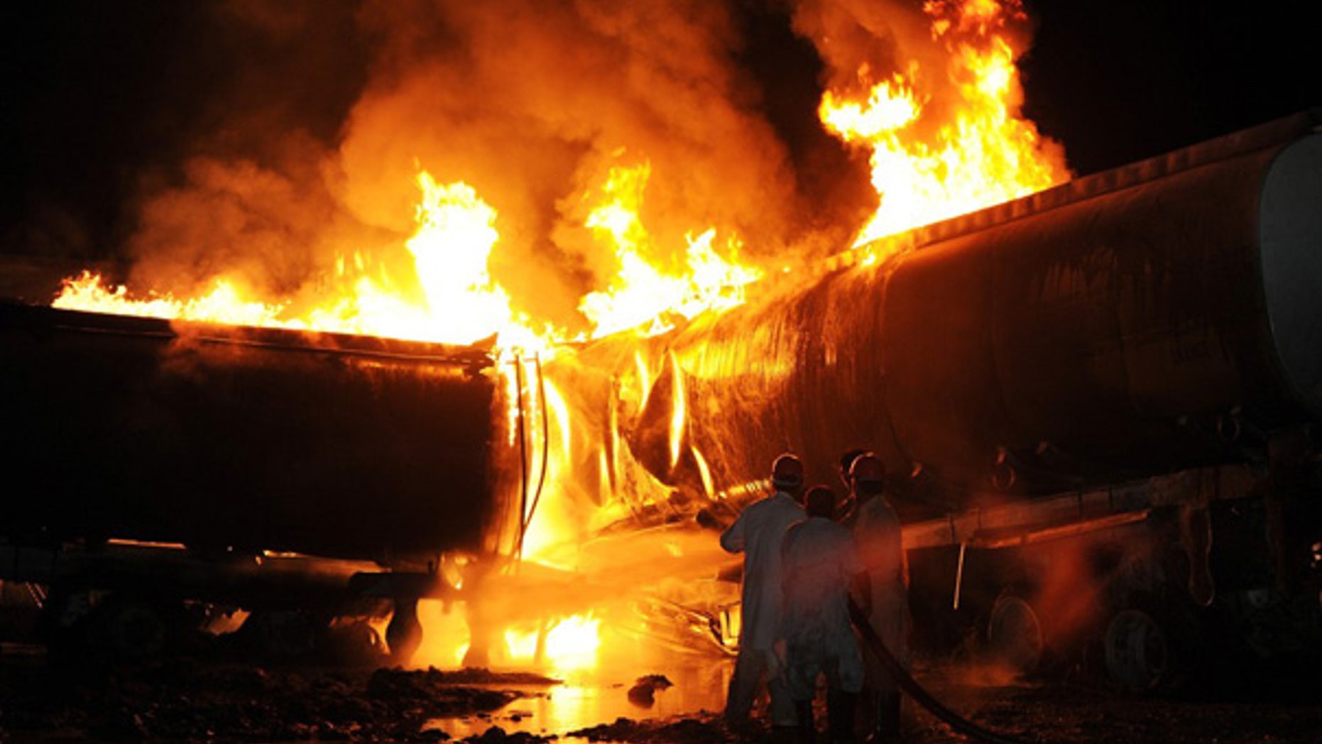 Oct. 4: Pakistani firefighters try to extinguish burning NATO supplies and oil tankers outside of Islamabad.