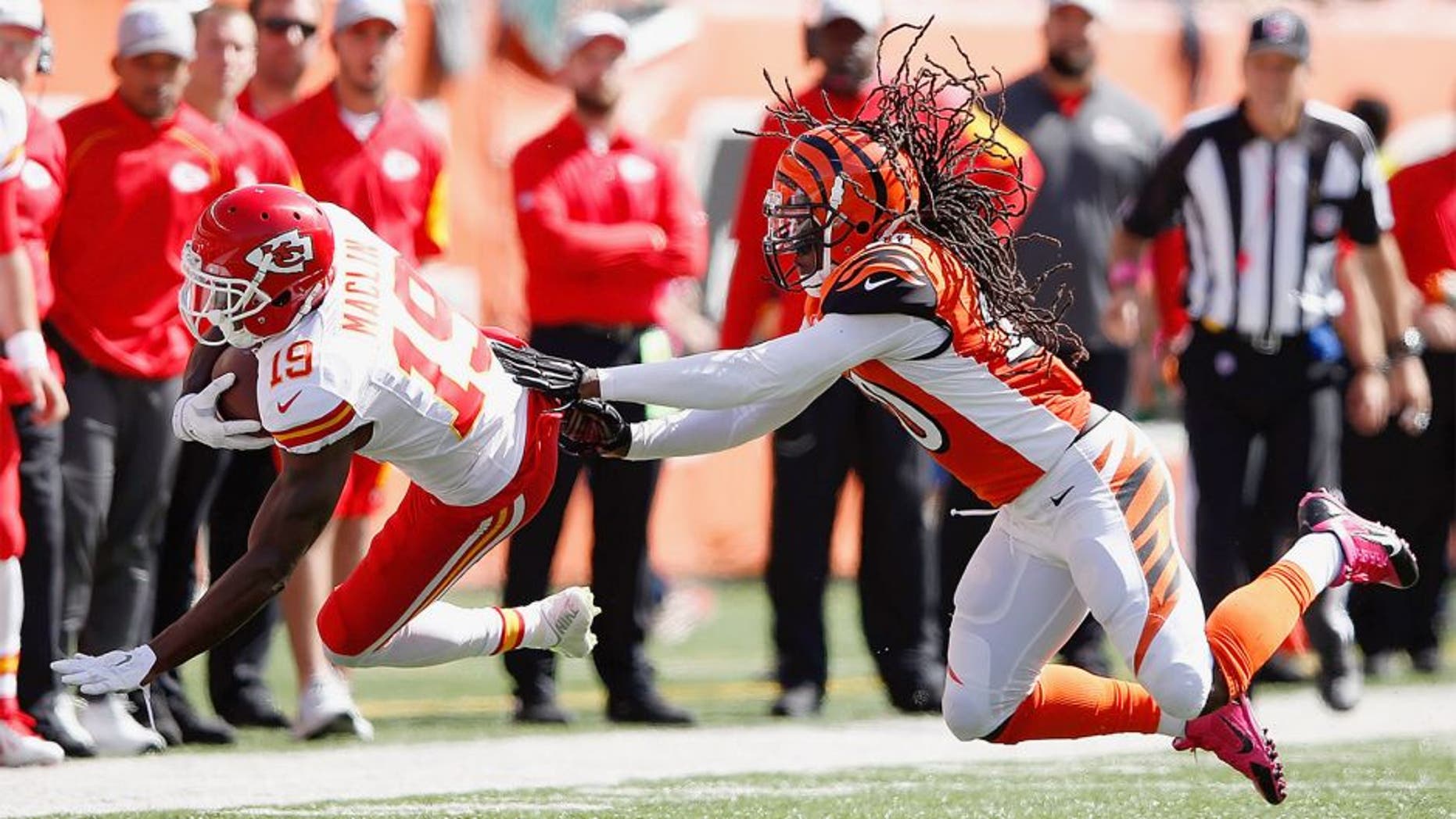 CINCINNATI, OH - OCTOBER 4: Reggie Nelson #20 of the Cincinnati Bengals knocks down Jeremy Maclin #19 of the Kansas City Chiefs after catching a pass during the second quarter at Paul Brown Stadium on October 4, 2015 in Cincinnati, Ohio. (Photo by Joe Robbins/Getty Images)