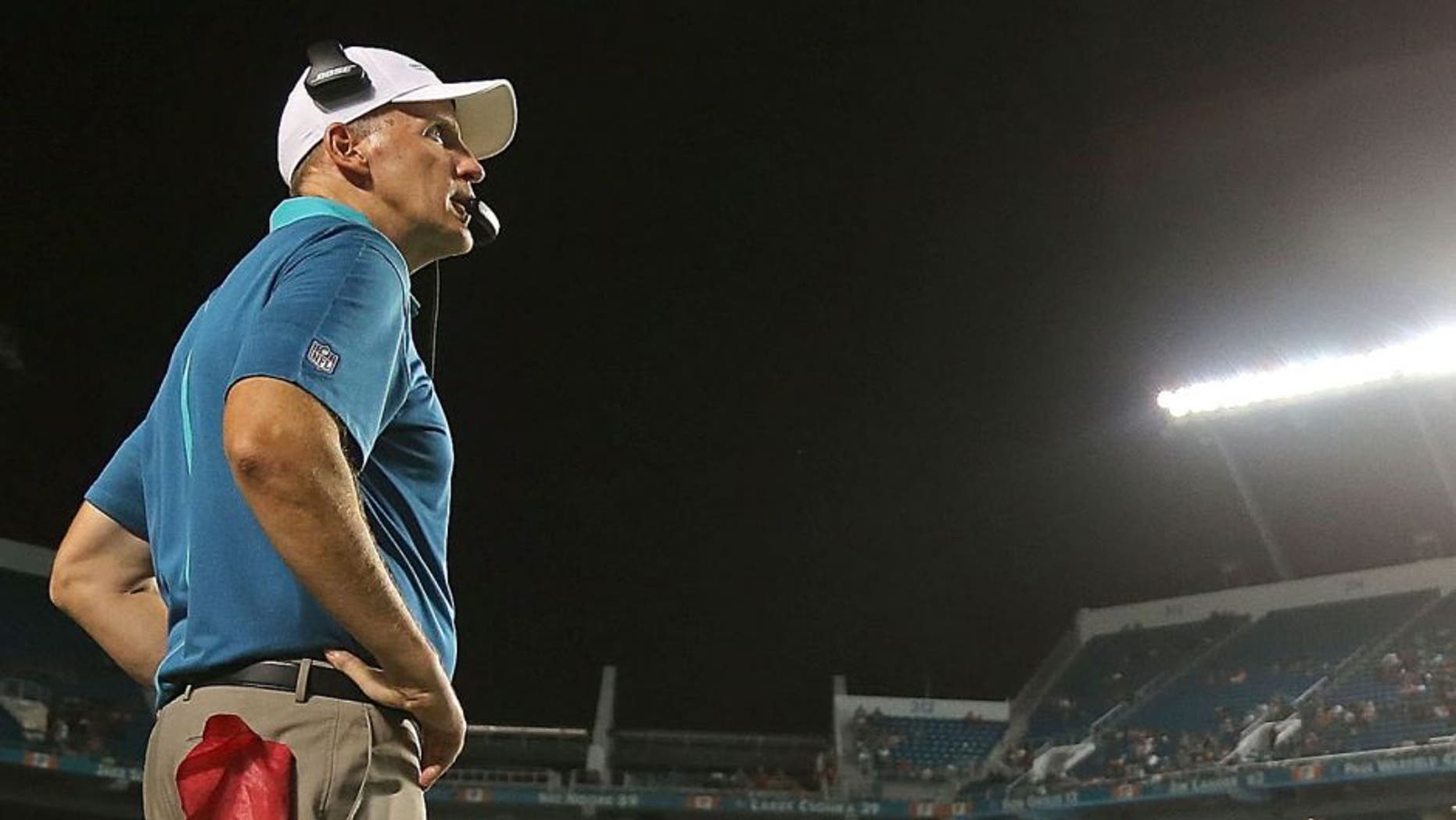 MIAMI GARDENS, FL - SEPTEMBER 03: Head coach Joe Philbin of the Miami Dolphins looks on during a preseason game against the Tampa Bay Buccaneers at Sun Life Stadium on September 3, 2015 in Miami Gardens, Florida. (Photo by Mike Ehrmann/Getty Images)
