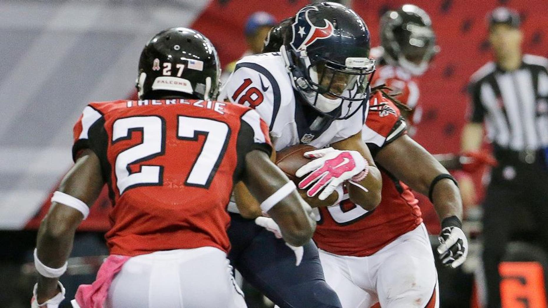 Houston Texans wide receiver Cecil Shorts (18) makes a catch for a touchdown against Atlanta Falcons defensive back Robenson Therezie (27) during the second half of an NFL football game, Sunday, Oct. 4, 2015, in Atlanta. (AP Photo/David Goldman)